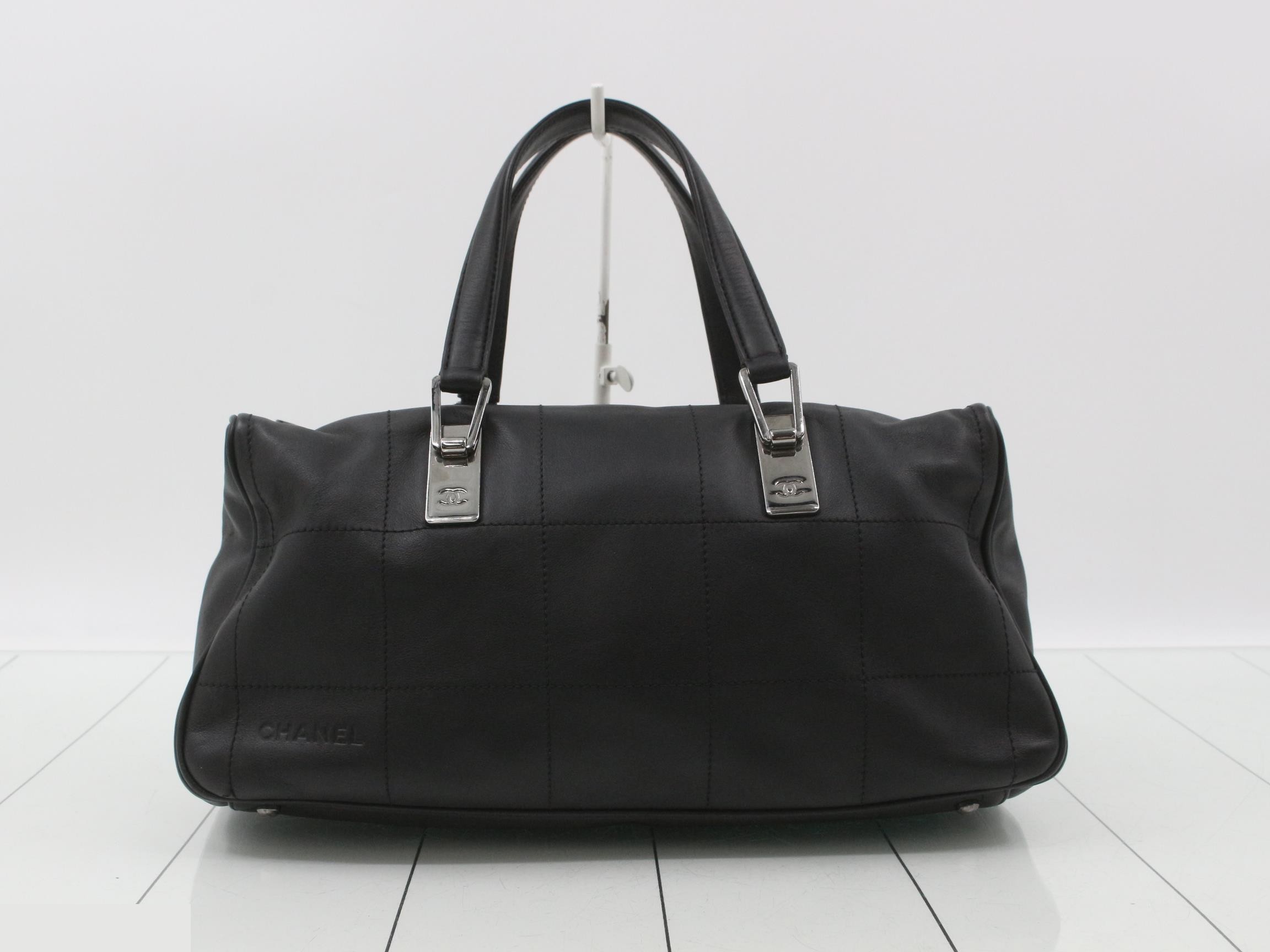 Chocolate bar mini Boston bag, lambskin, black, with sticker, item number 7.