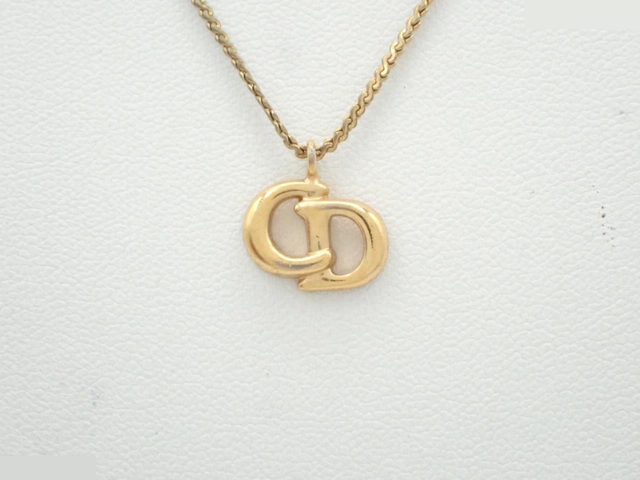 Other line: Precious metal/CD logo necklace/pendant, chain approximately 42cm.