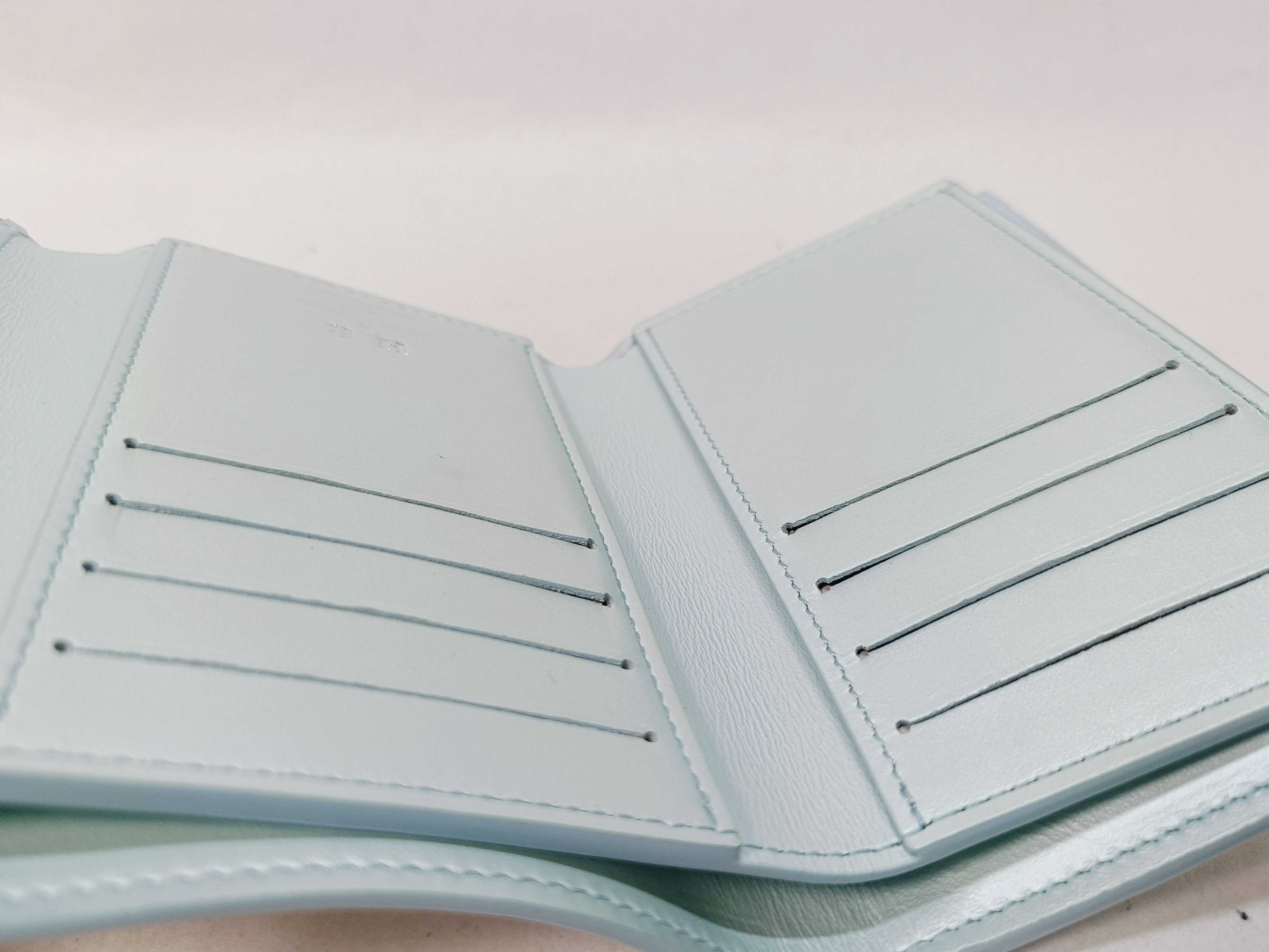Limited Edition Taurillon Leather Portefeuille Capucines Blue Wallet with Name Engraving — view 13