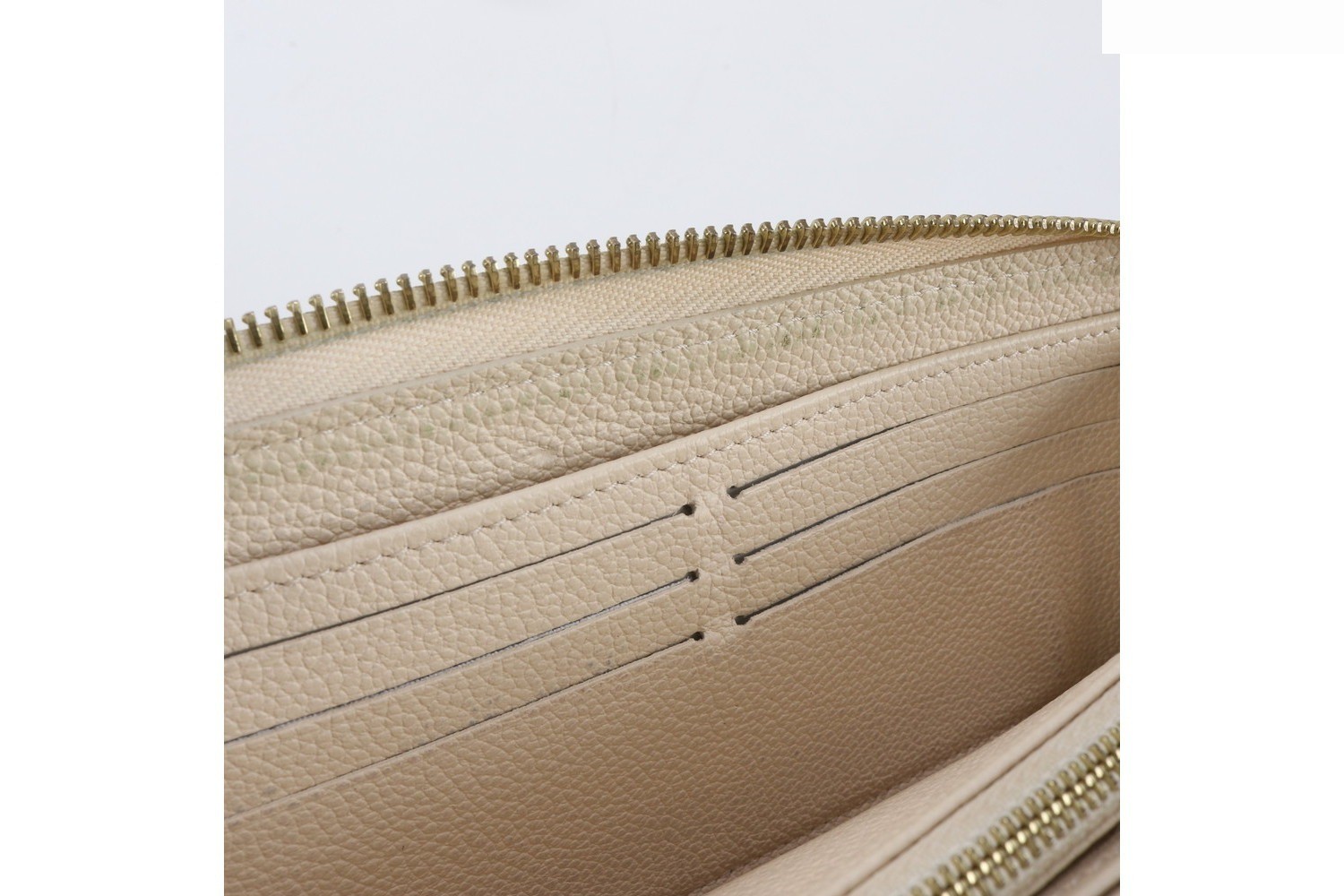 RFID-enabled Monogram Empreinte Zippy Wallet M82212 — view 8