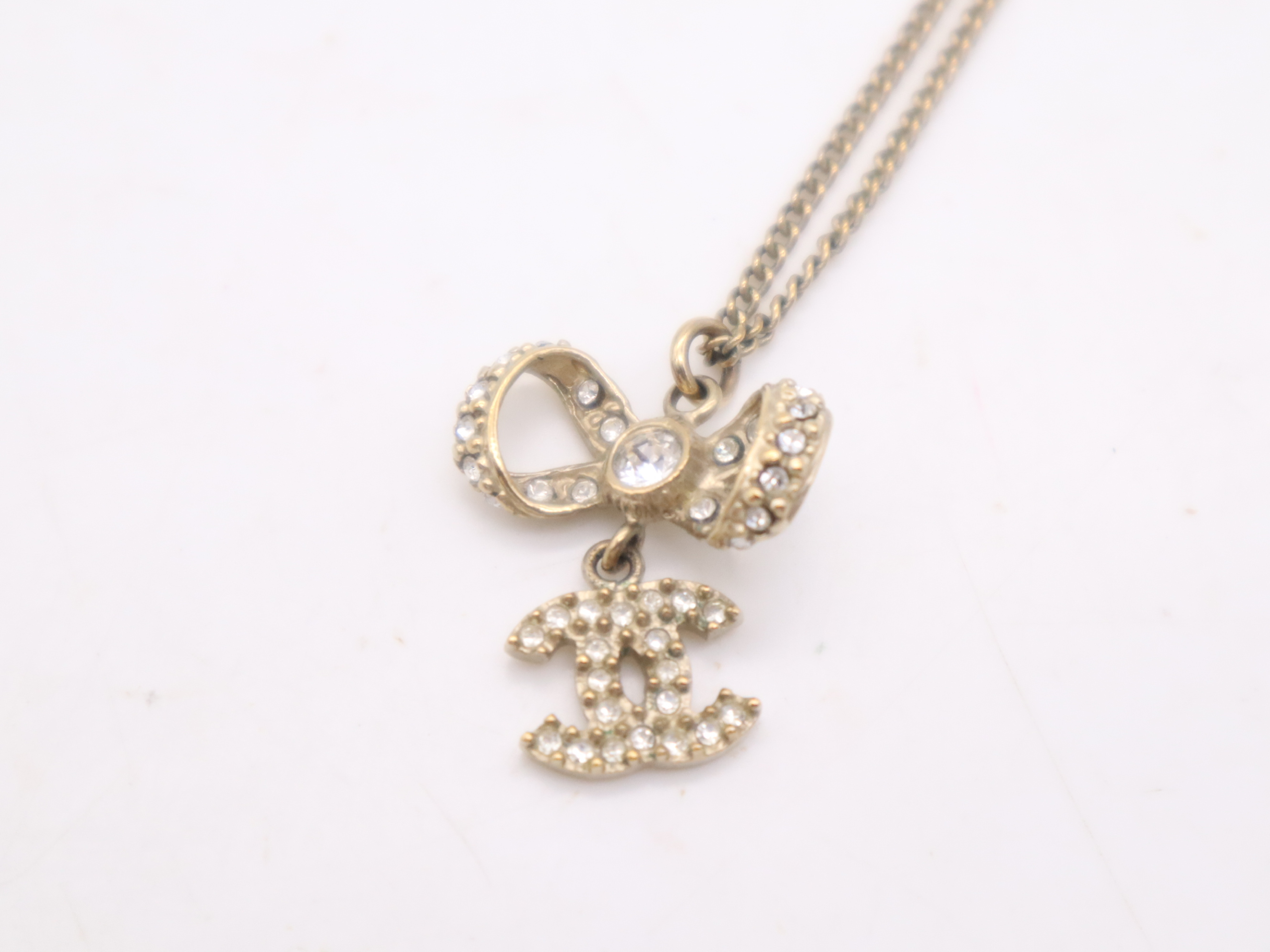 Gold Ribbon Coco Mark Necklace — view 7