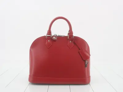 Epi Alma PM Coquelicot Handbag