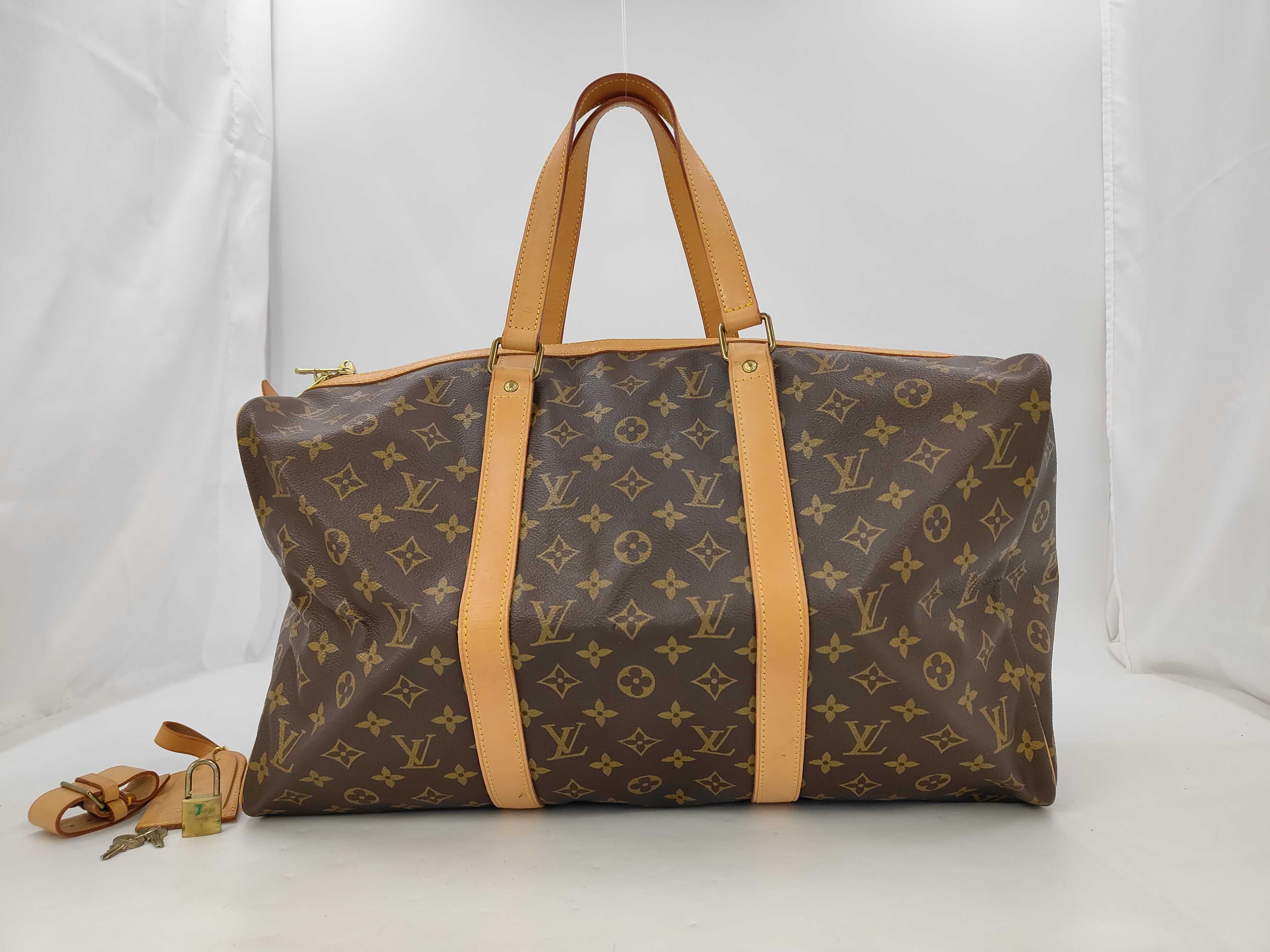 LV Monogram Saxophone Souple 45 Shoulder Bag M41624