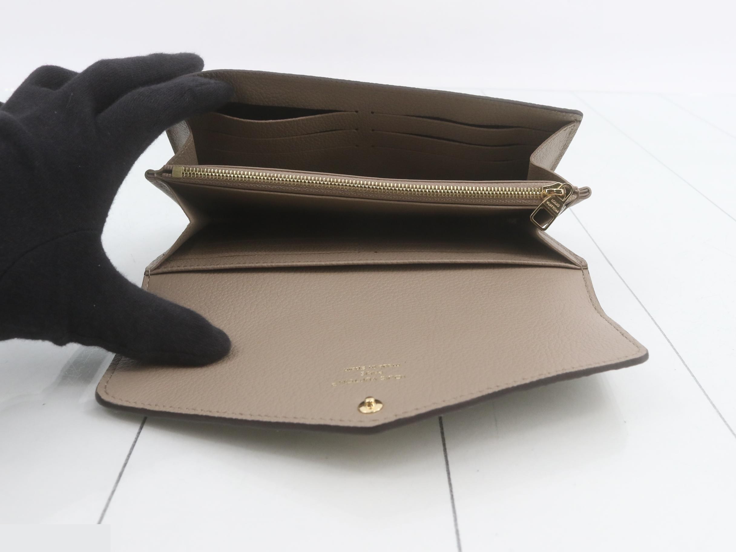 Unused M82256 Monogram Empreinte Portefeuille Sarah — view 4