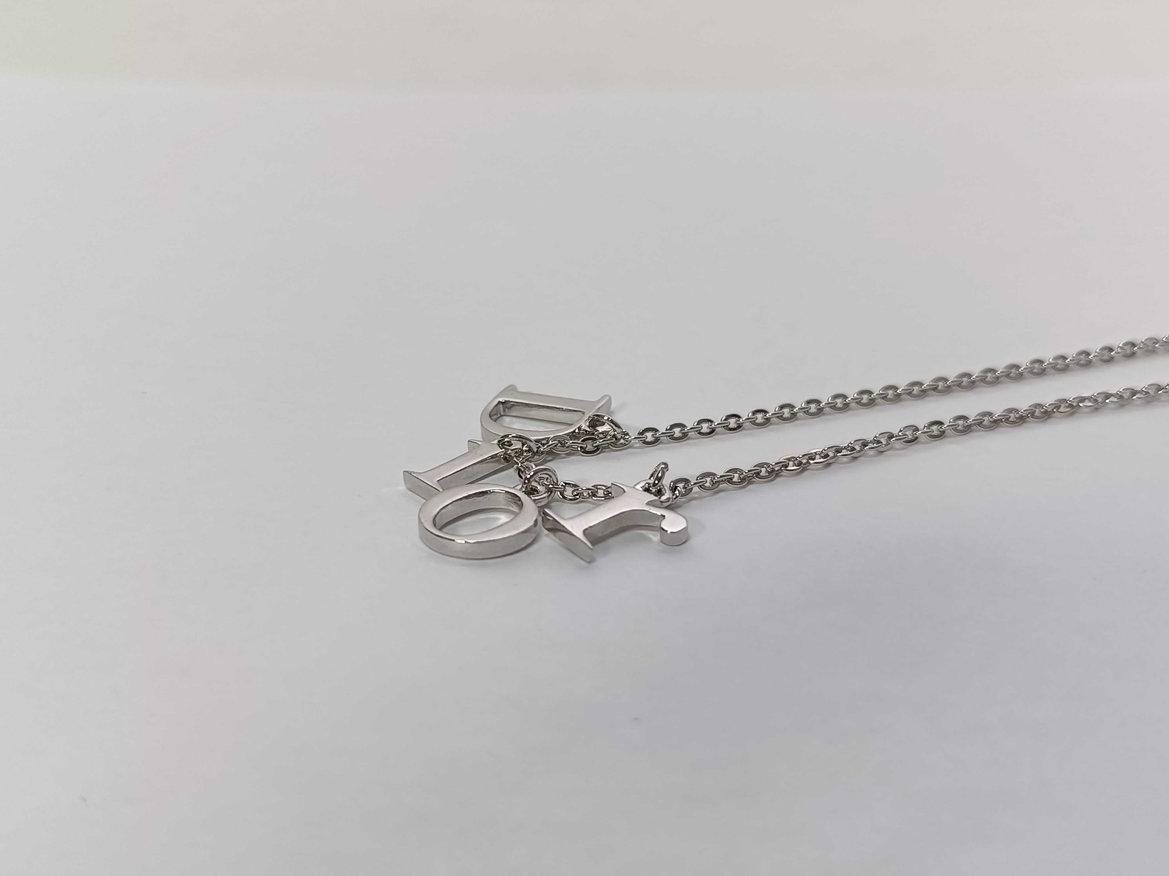 SV logo necklace — view 2