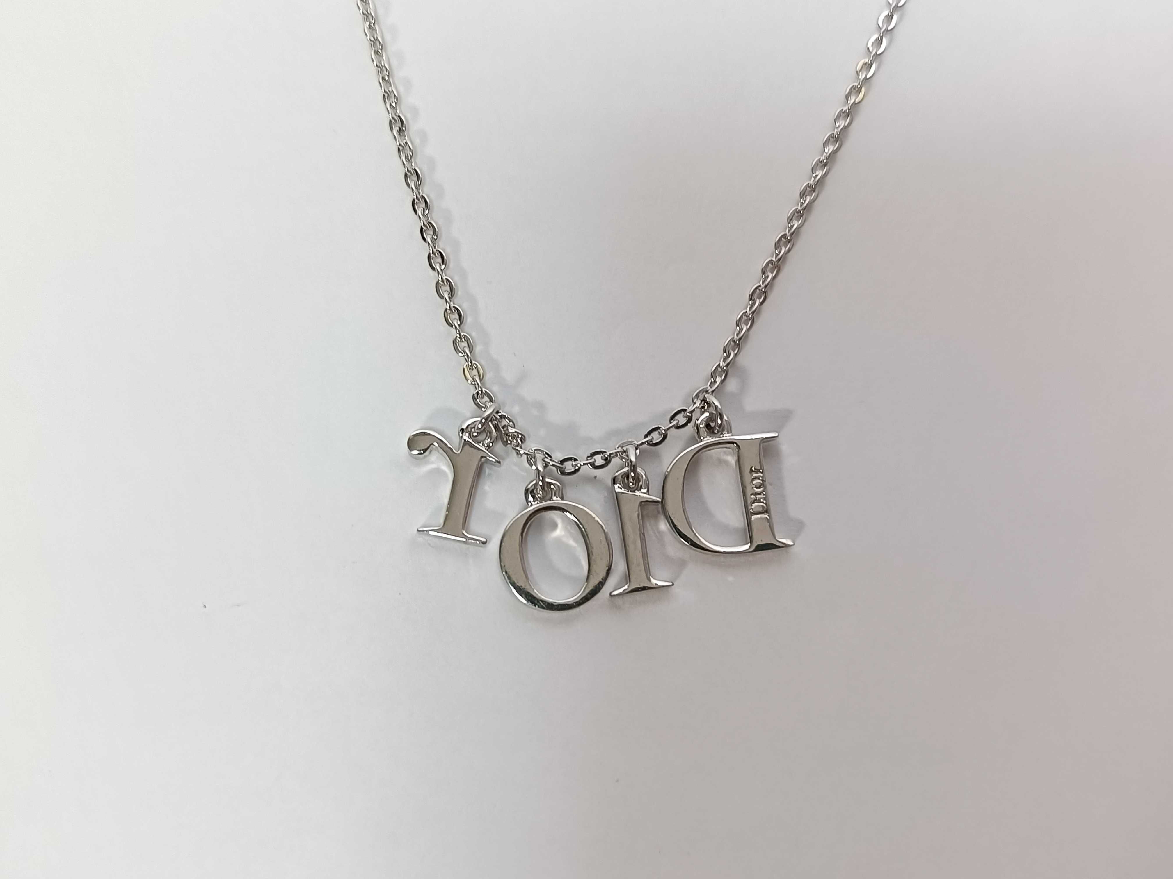 SV logo necklace — view 3