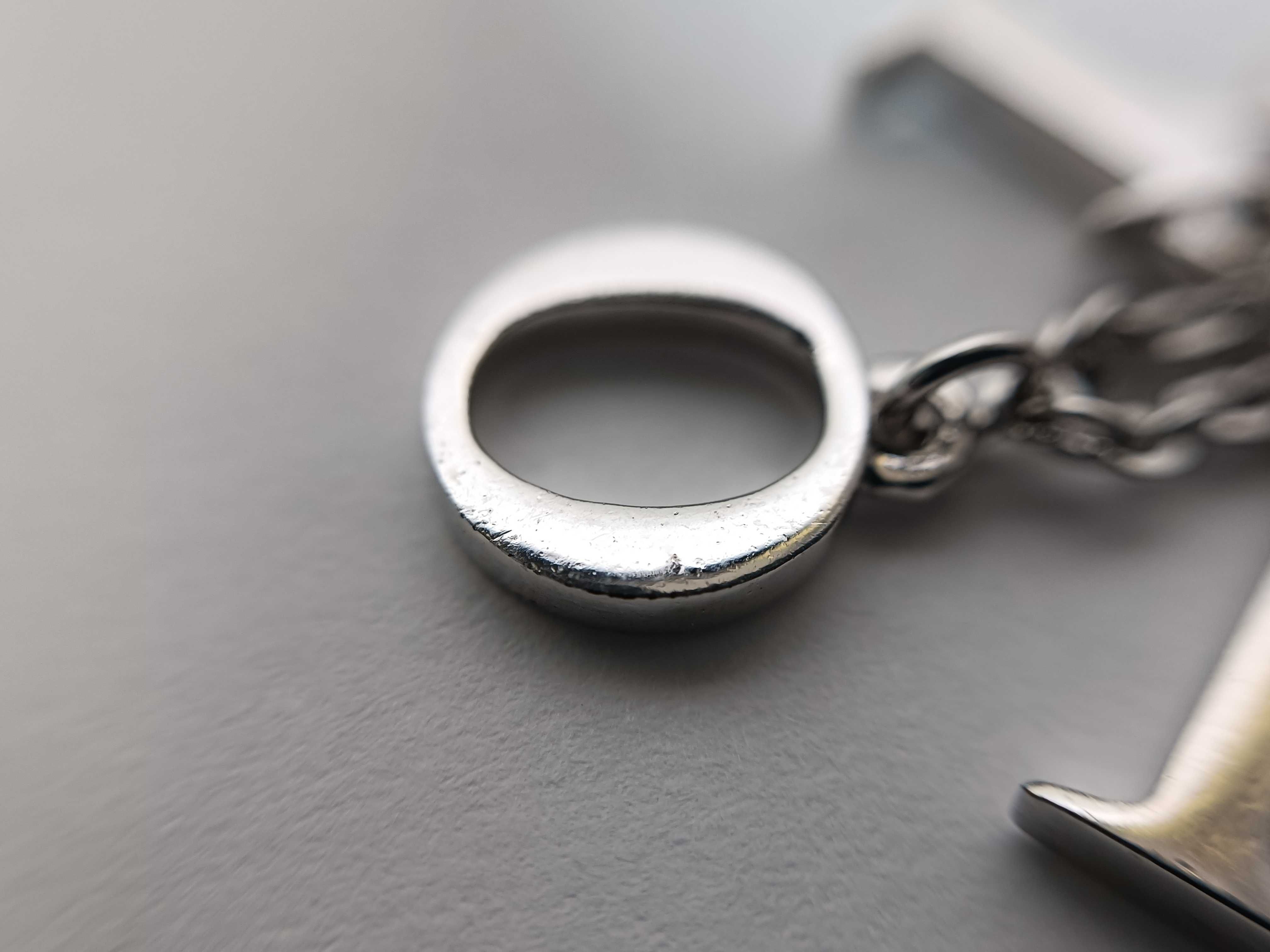 SV logo necklace — view 9