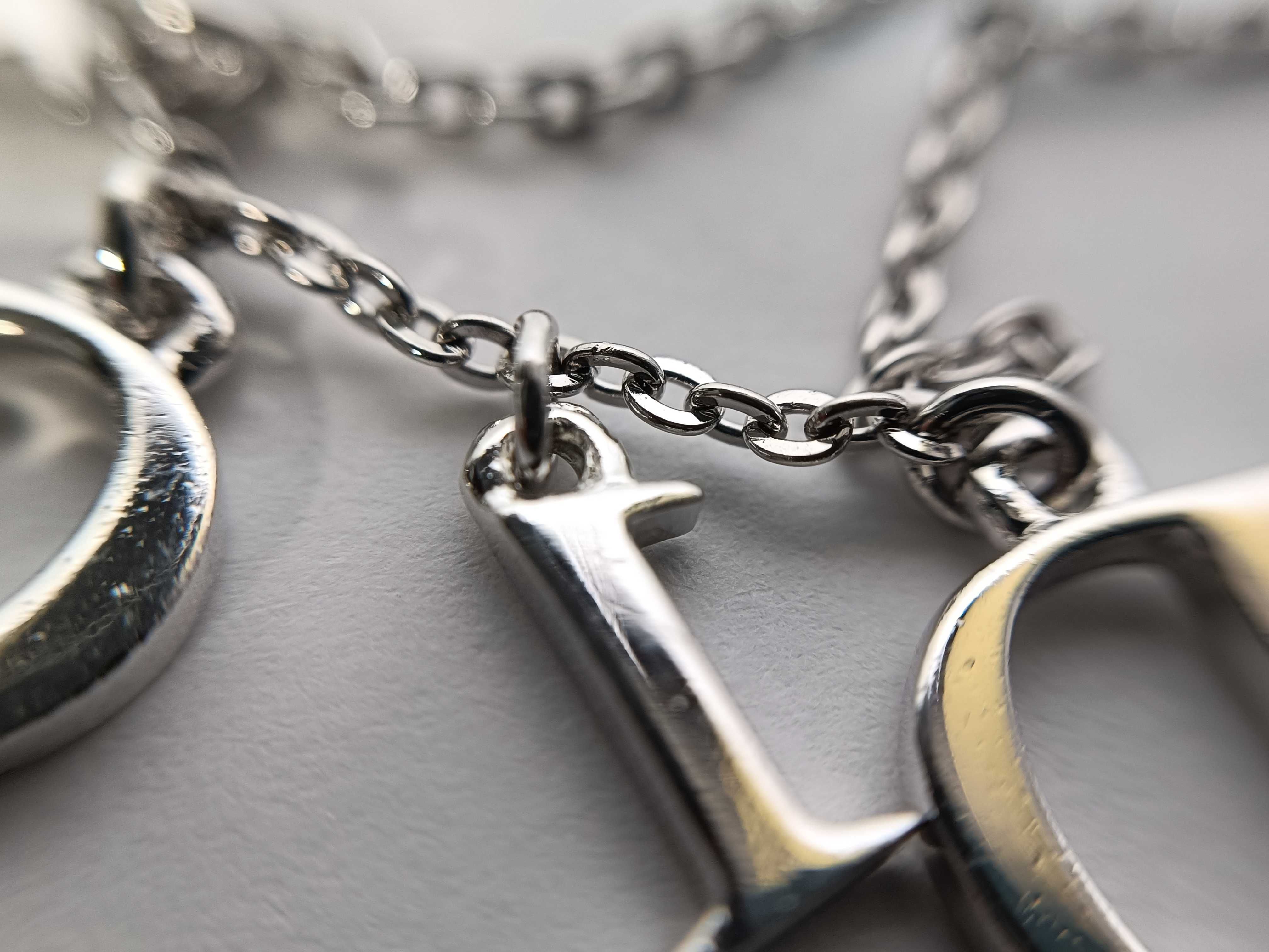 SV logo necklace — view 10