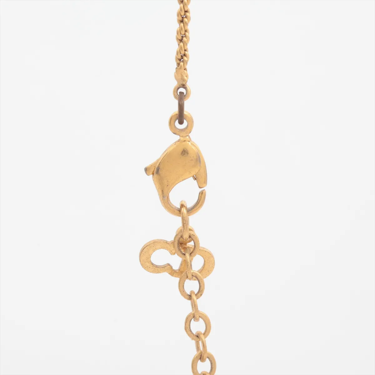 CD logo necklace, gold plated with rhinestones. Shows signs of wear, — view 3