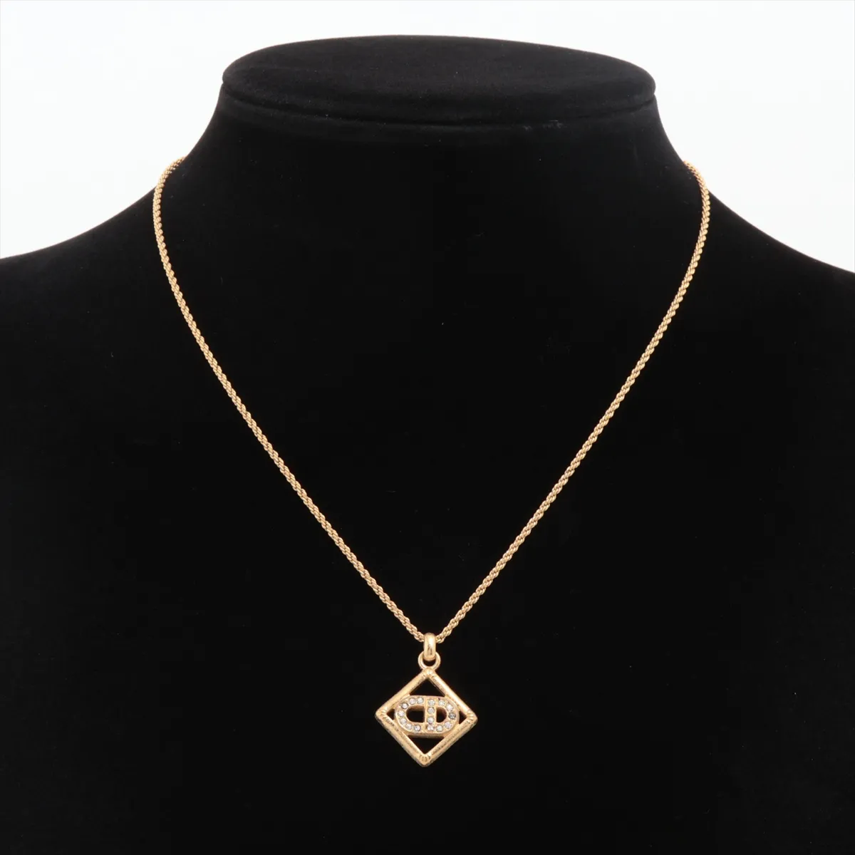 CD logo necklace, gold plated with rhinestones. Shows signs of wear, — view 5