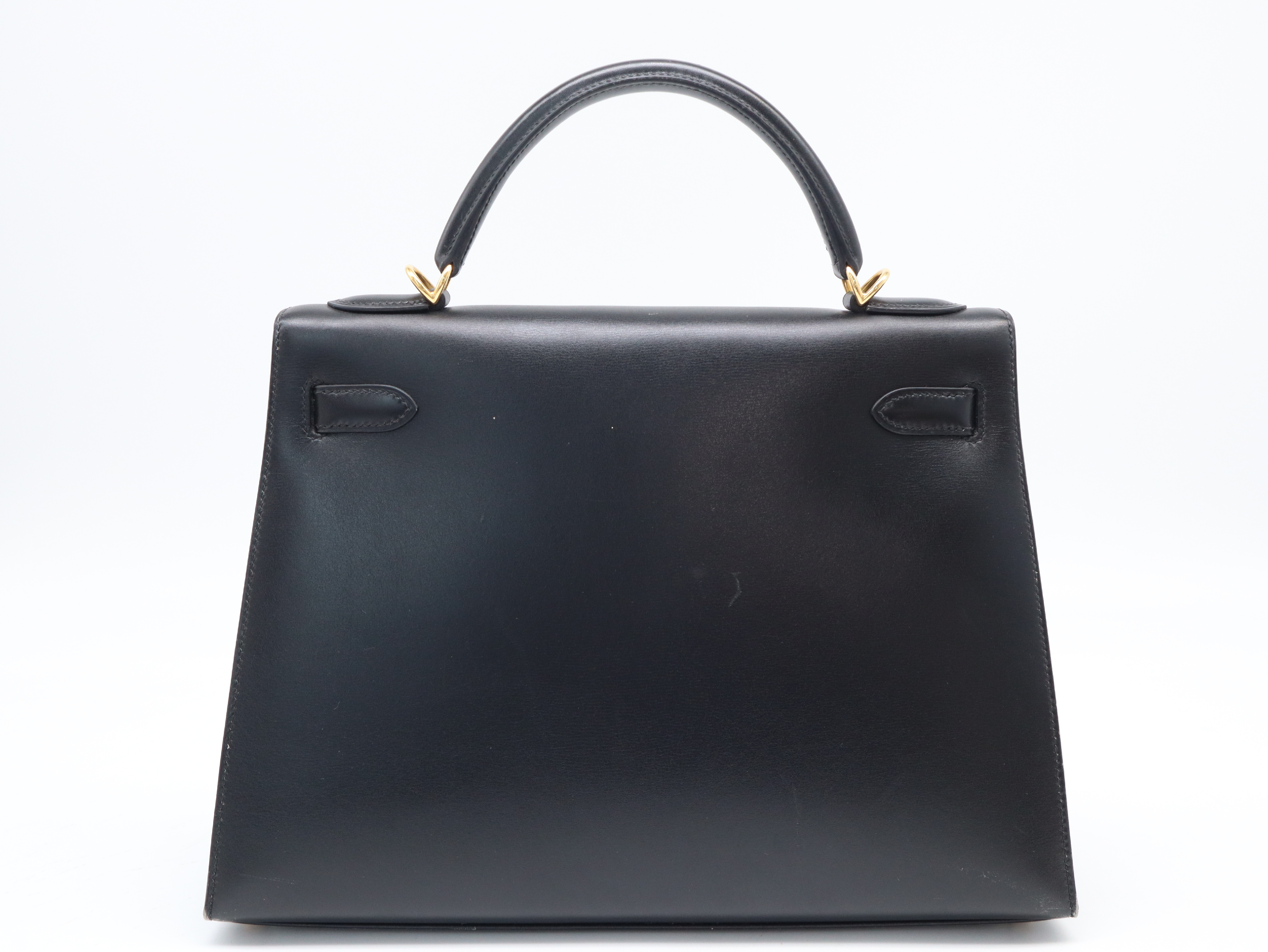Kelly 28 handbag, W stamp, Taurillon leather, gold hardware, Noir (black), includes shoulder strap, clochette, padlock, 2 keys, box, and dust bag. — view 2