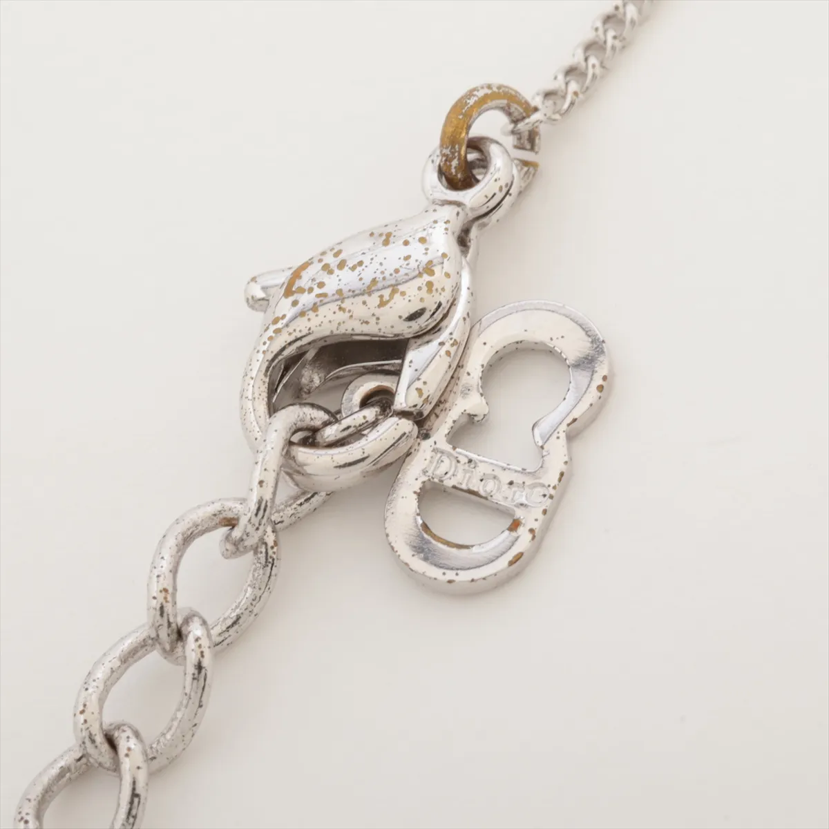 logo necklace, metal, silver. Shows signs of wear, including dents, — view 4