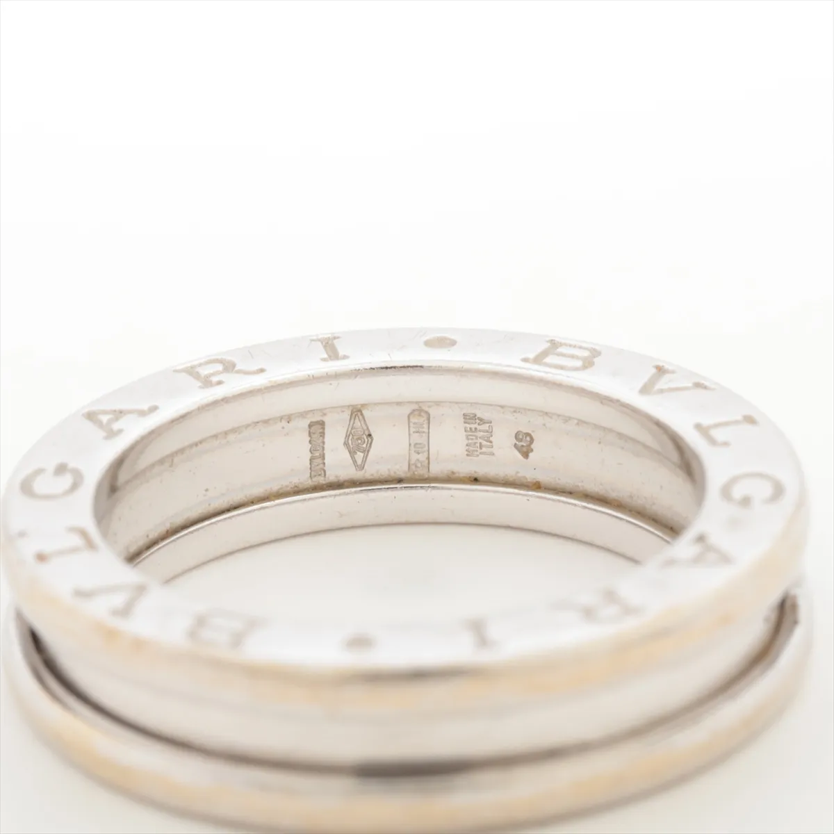 B.zero1 ring, 750 (WG), 5.8g, size 48. Shows signs of wear, dents, and some plating peeling. — view 5