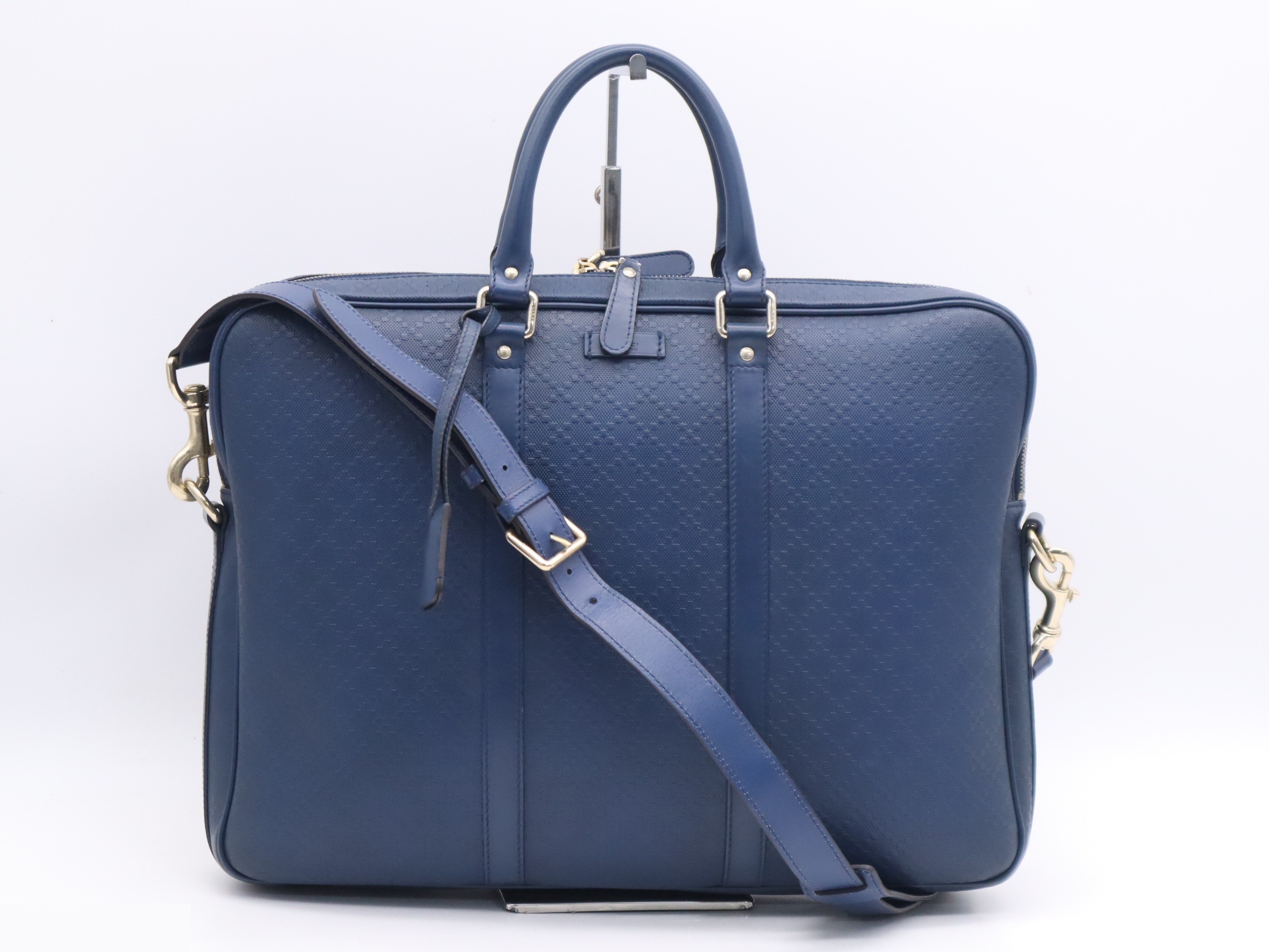 Leather Diamante pattern handbag, navy, gold hardware, shoulder strap.