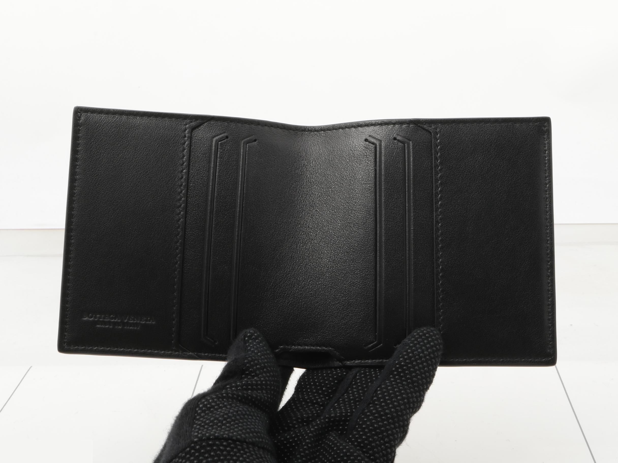 Other lines: Bags & Wallets, Leather, Black, Bi-fold Wallet — view 4