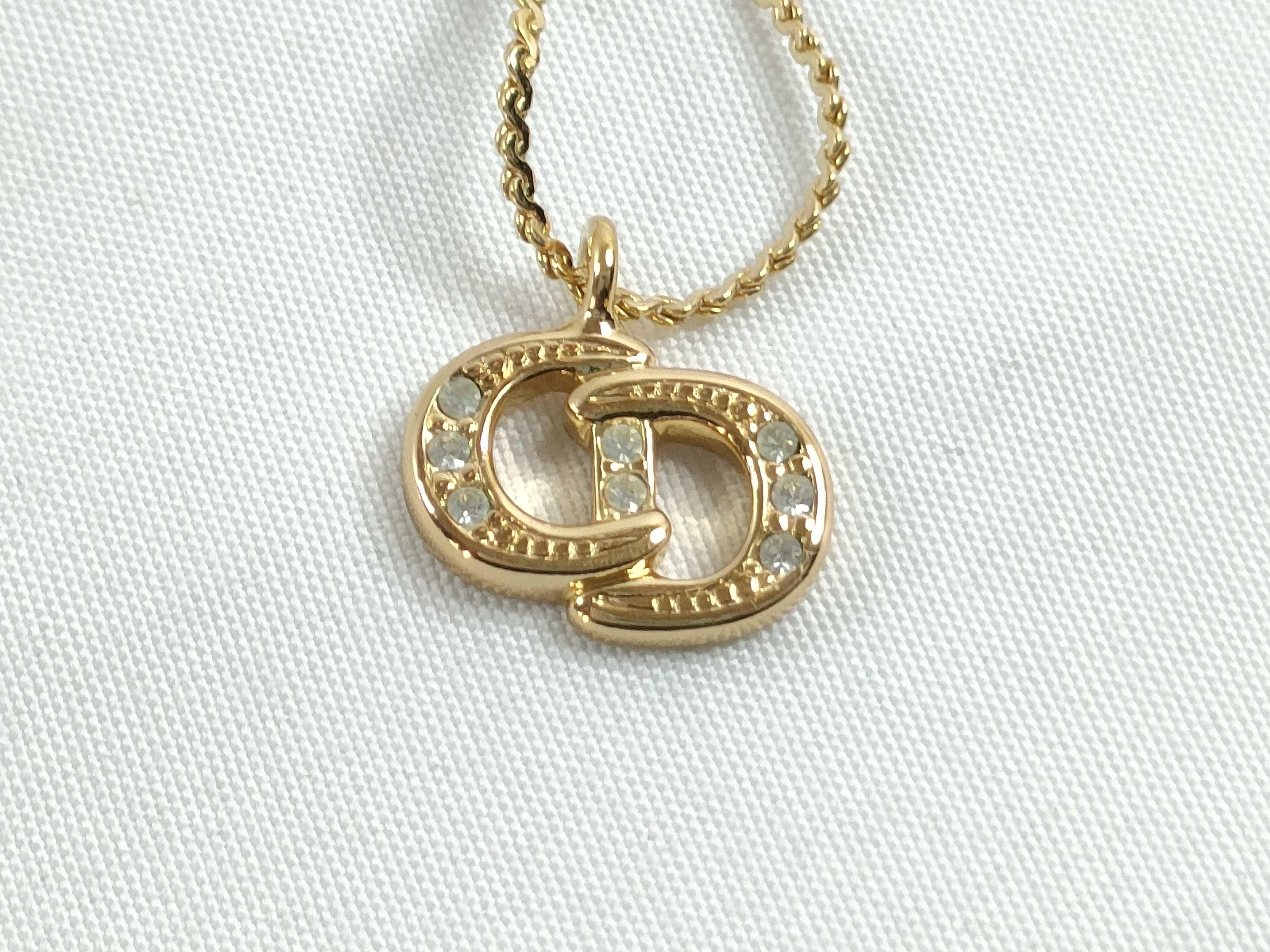logo necklace, gold necklace
