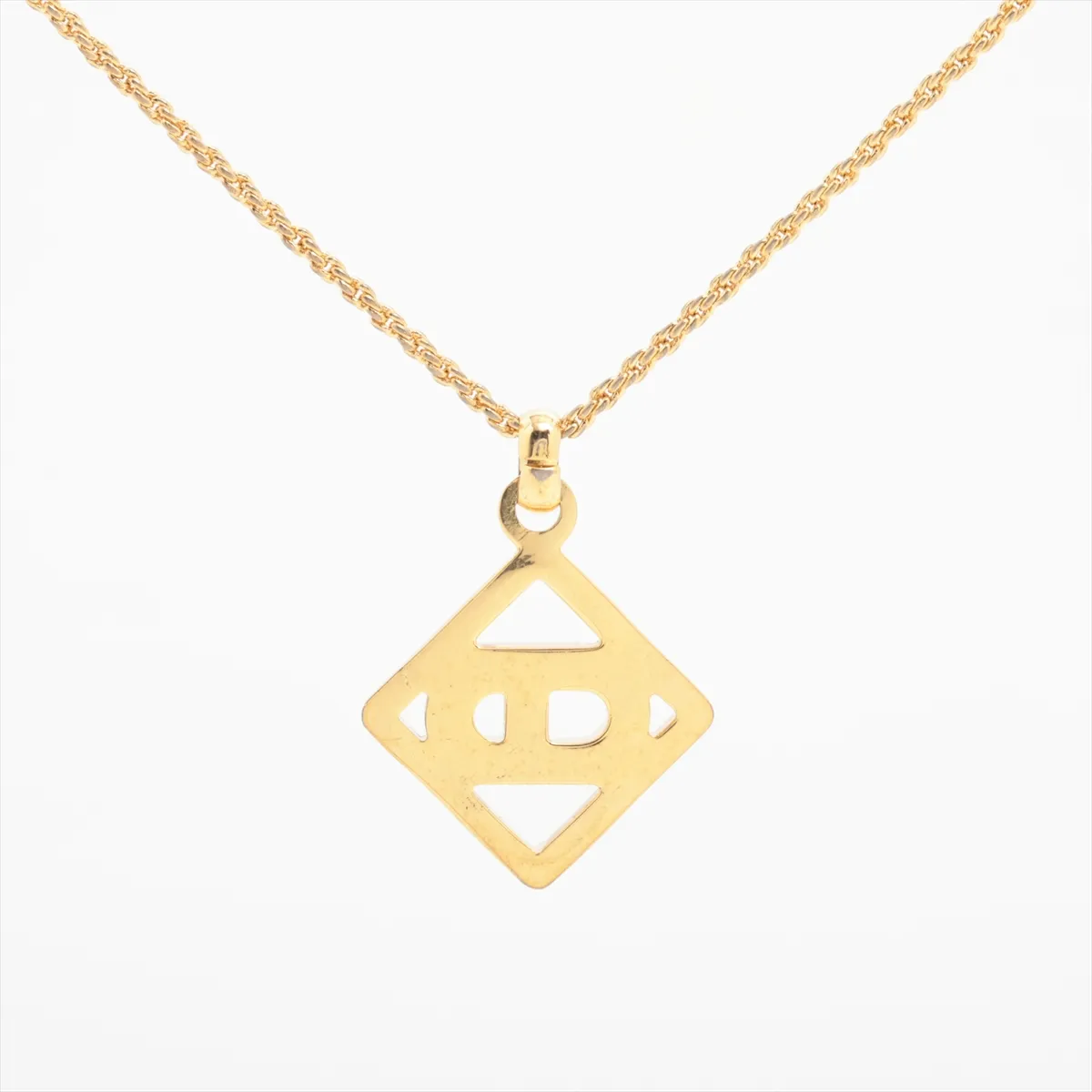 CD logo necklace, gold plated with rhinestones. Shows signs of wear, — view 2