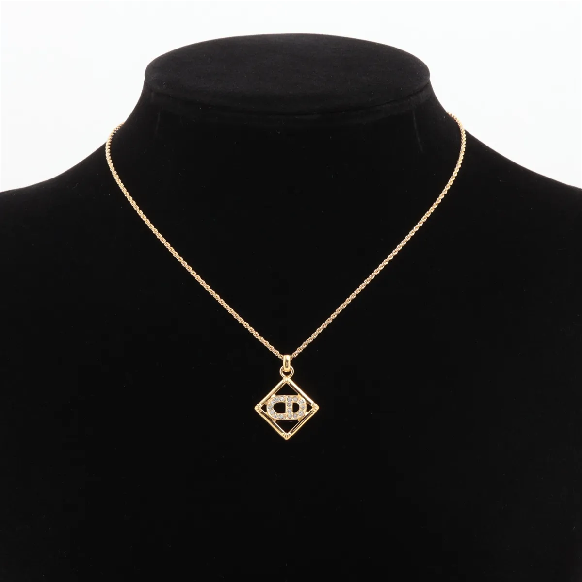 CD logo necklace, gold plated with rhinestones. Shows signs of wear, — view 5