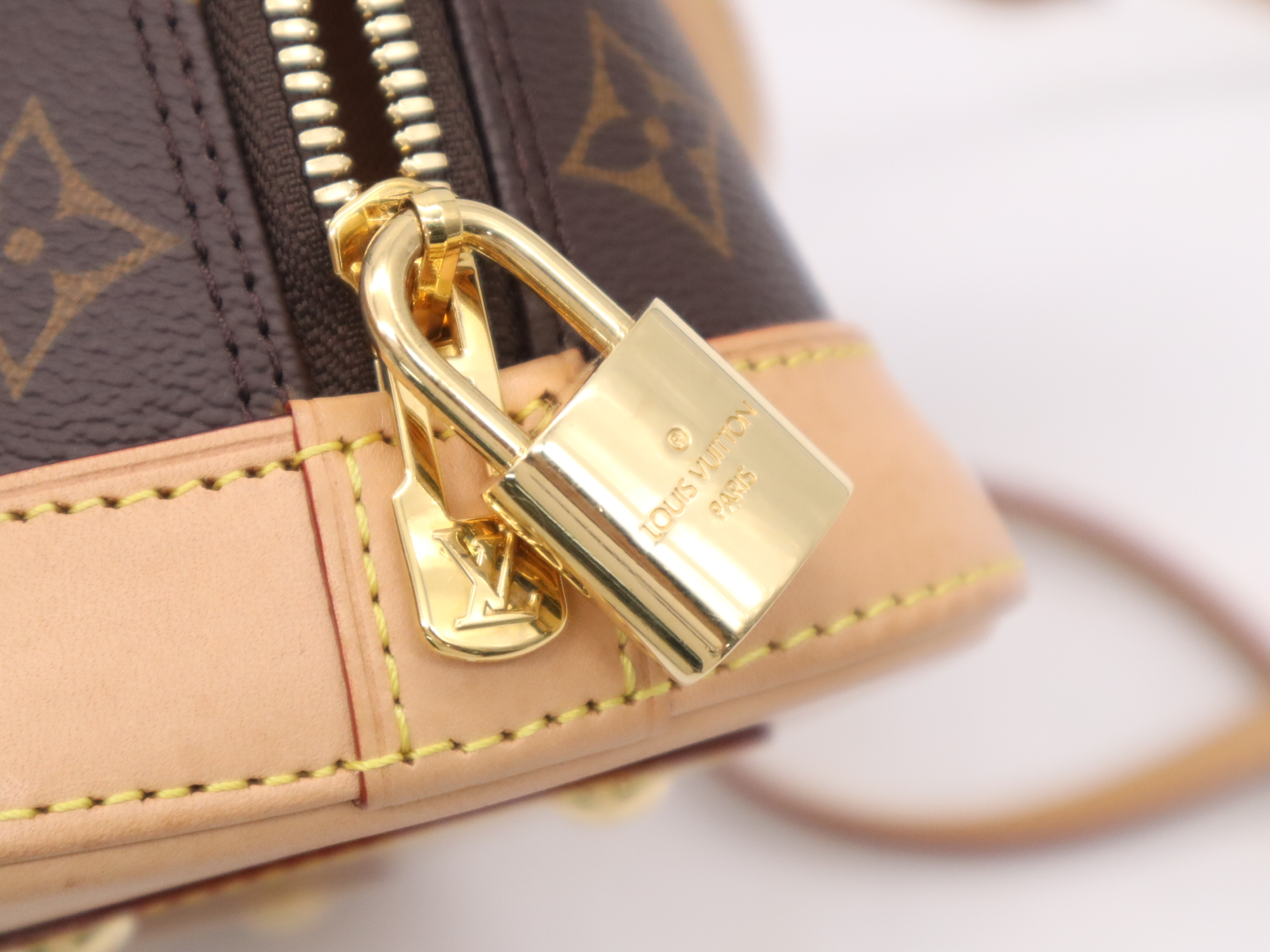 M53152 Monogram Alma BB Handbag with Shoulder Strap, Padlock, 2 Keys, Clochette, and Dust Bag — view 13