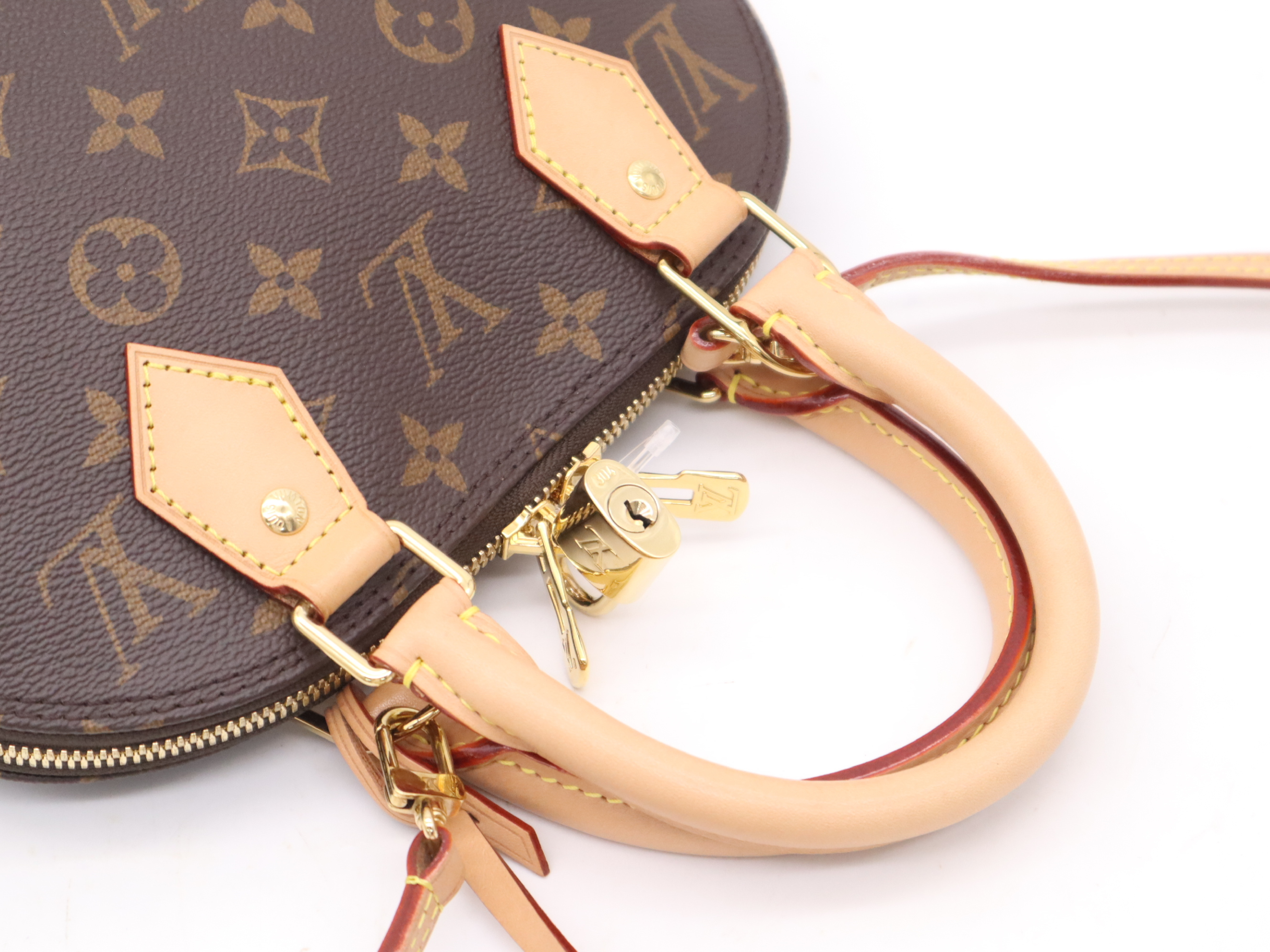 M53152 Monogram Alma BB Handbag with Shoulder Strap, Padlock, 2 Keys, Clochette, and Dust Bag — view 6