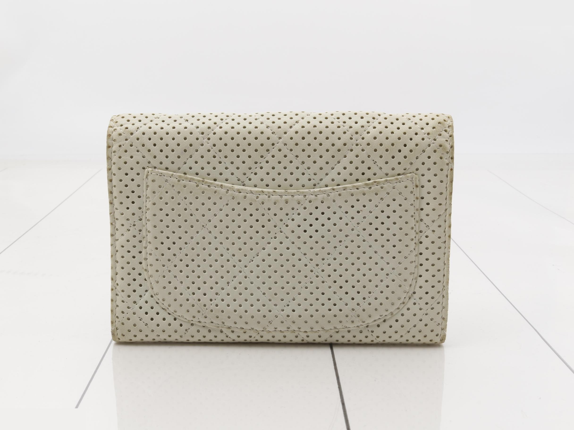 Perforated wallet, white, with sticker. — view 2