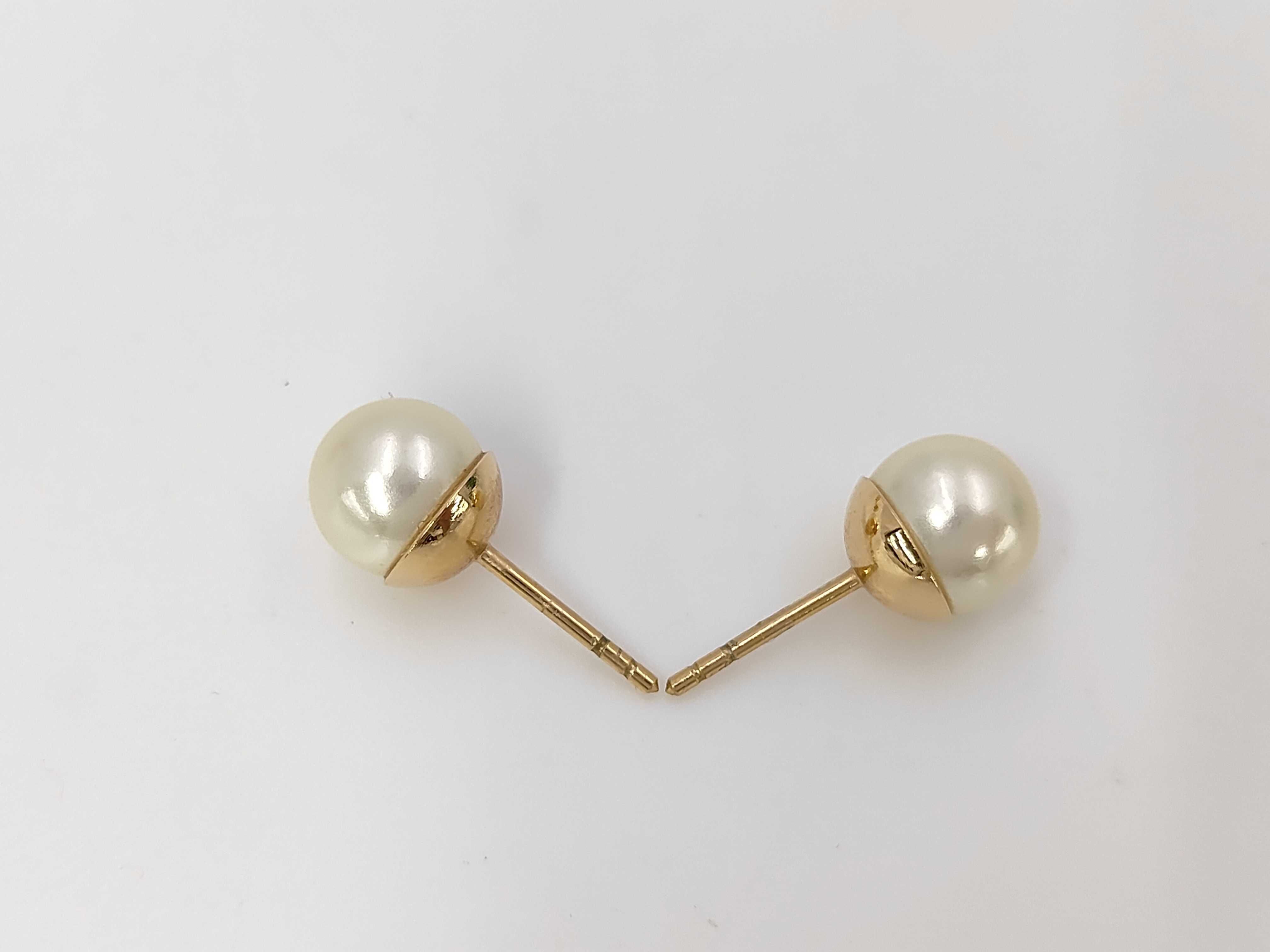 pearl logo earrings in box — view 4
