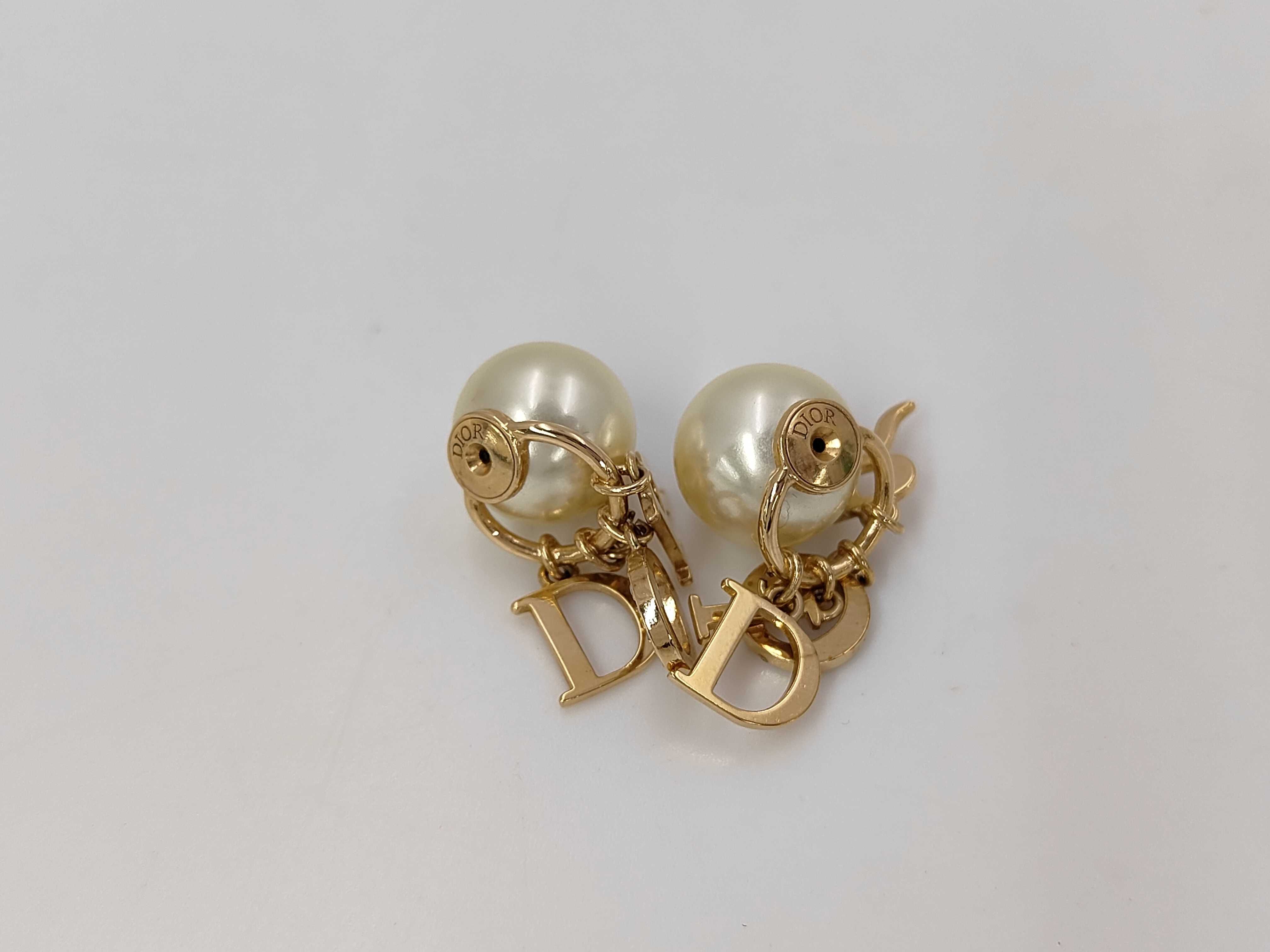pearl logo earrings in box — view 5