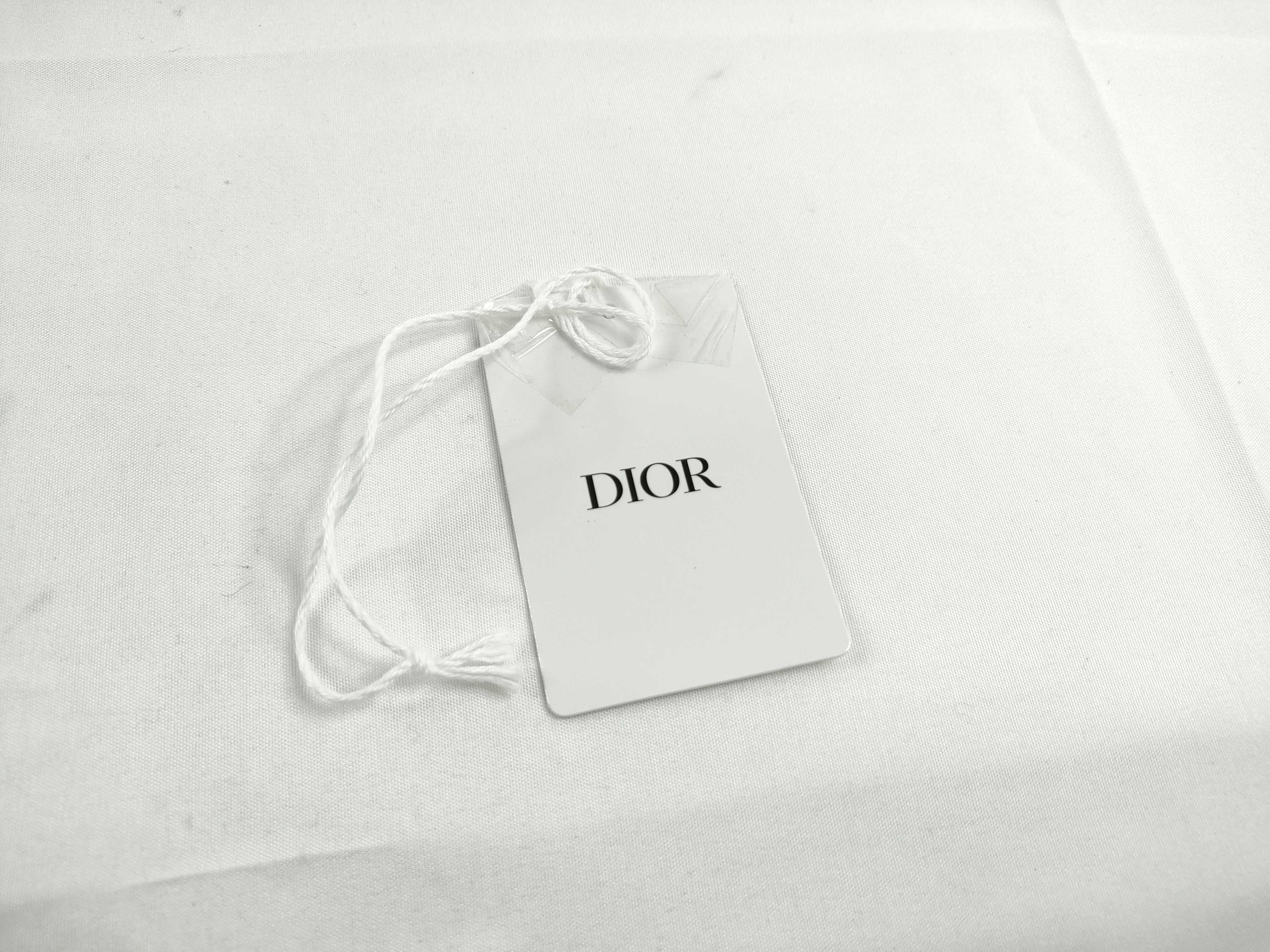 Roman alphabet charm, "J," with tag. — view 8