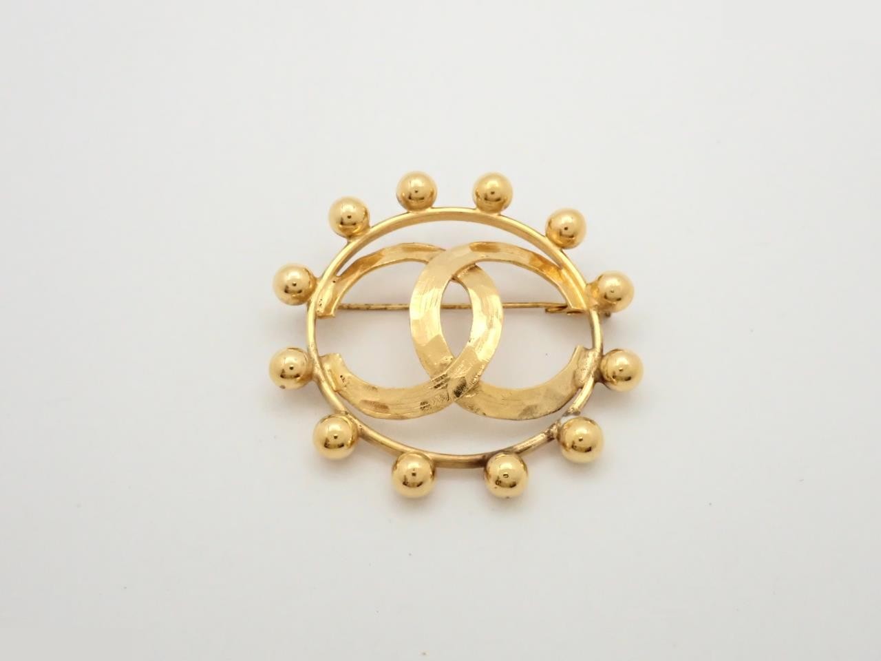 coco mark brooch