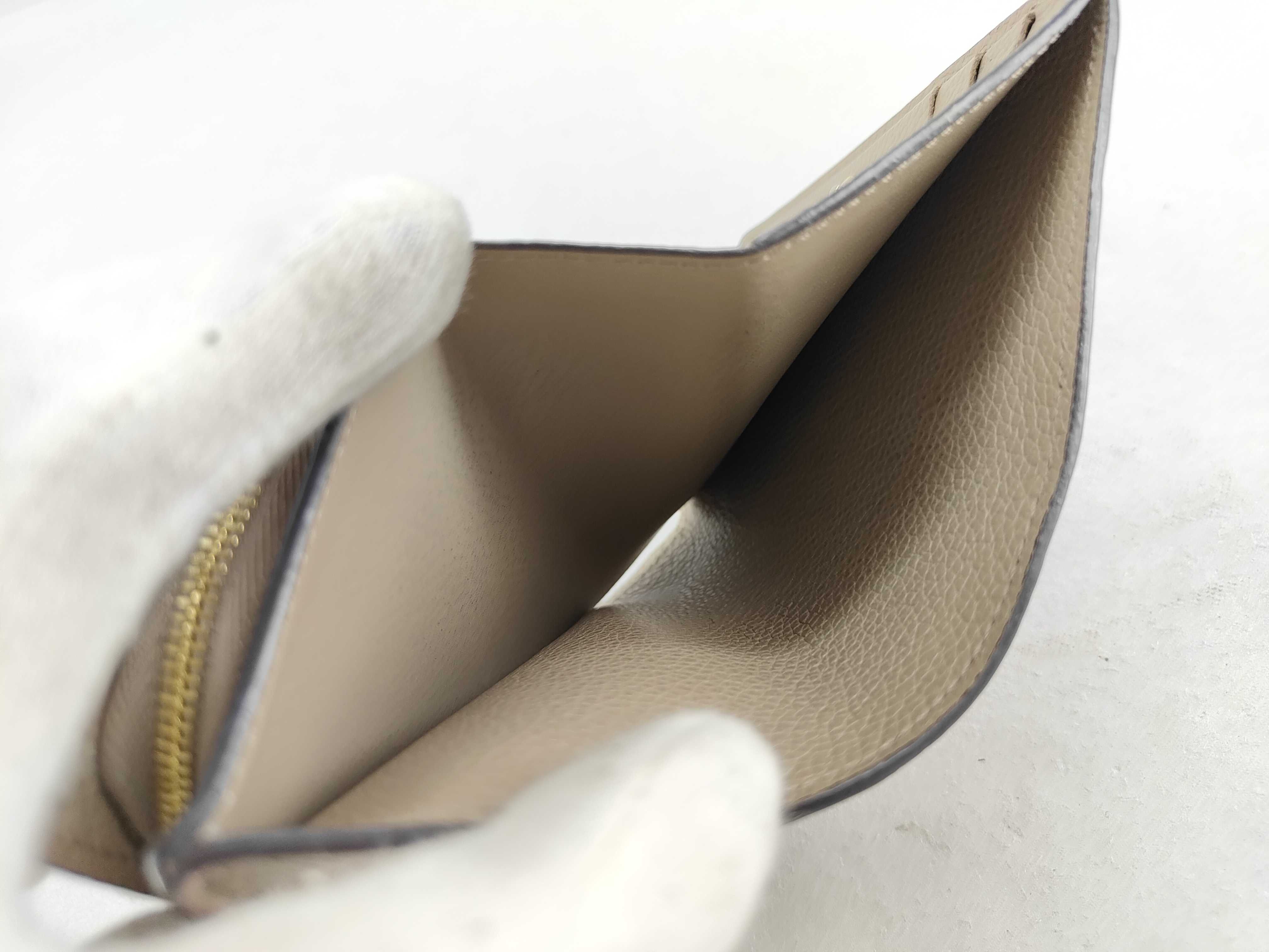 Monogram Empreinte Portefeuille Claire M80152 Tourtrell Compact Wallet — view 10