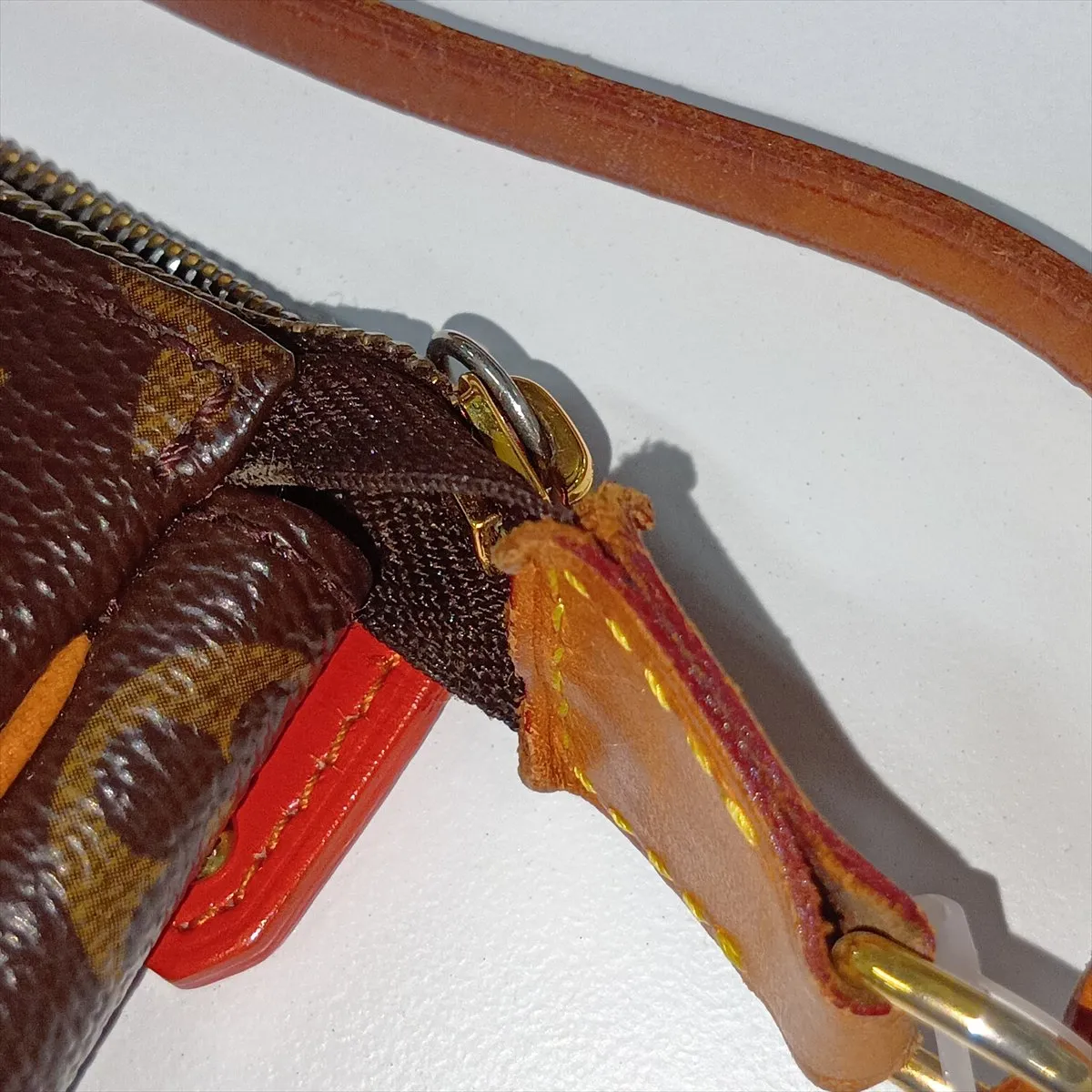 Monogram Perforated Pochette Accessoires M95185 BA0026 Brown — view 11