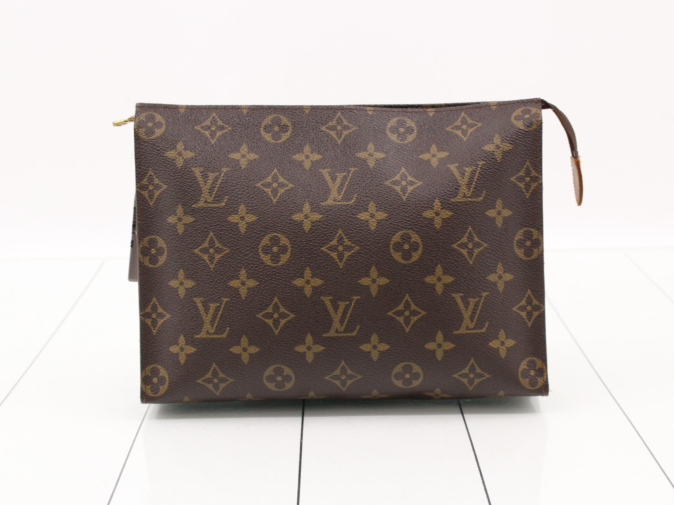 Monogram handbag, pochette, toilette, second bag