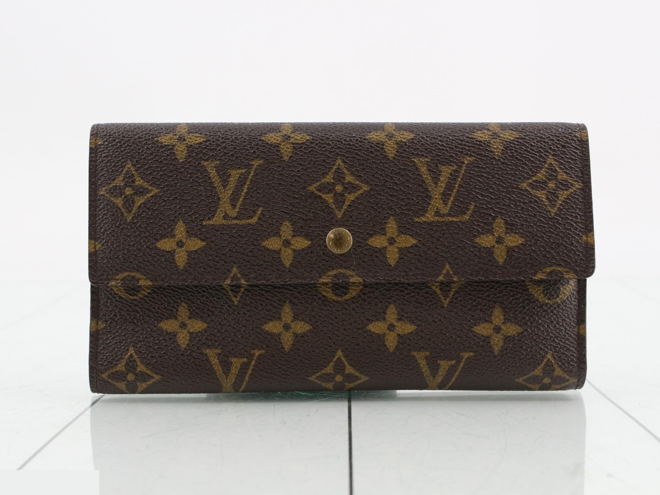 Monogram Portefeuille Tresor International Tri-fold Long Wallet