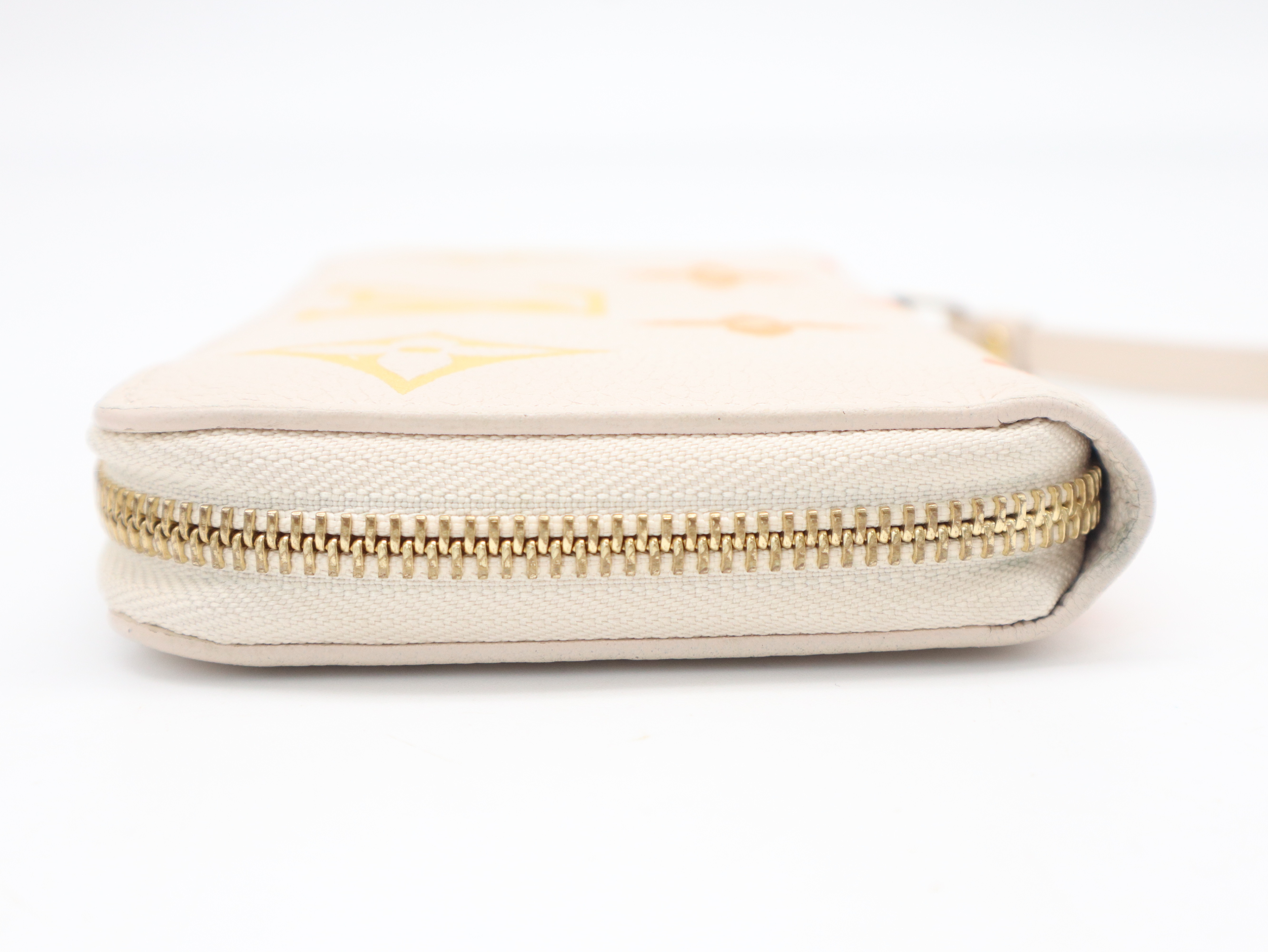 M82206 Monogram Empreinte LV Gradient Zippy Wallet White — view 5