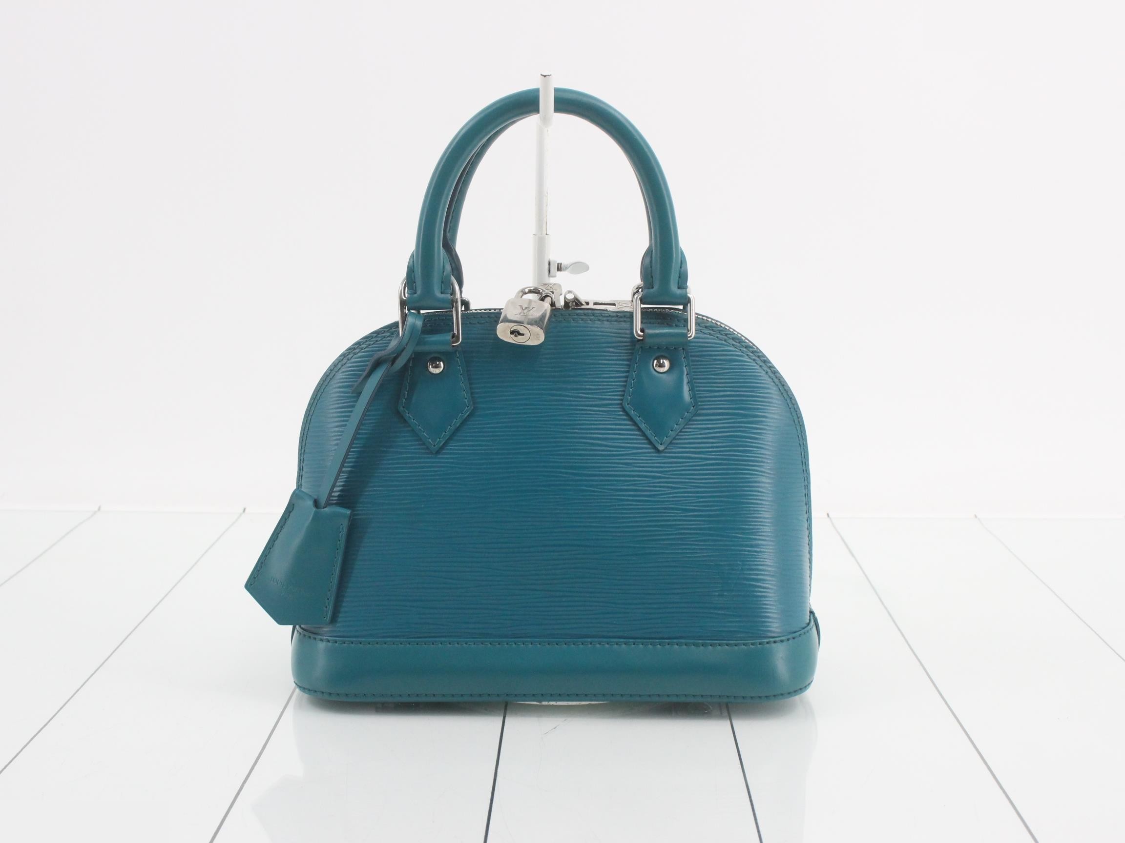 Epi Alma BB Cyan 2-Way Handbag