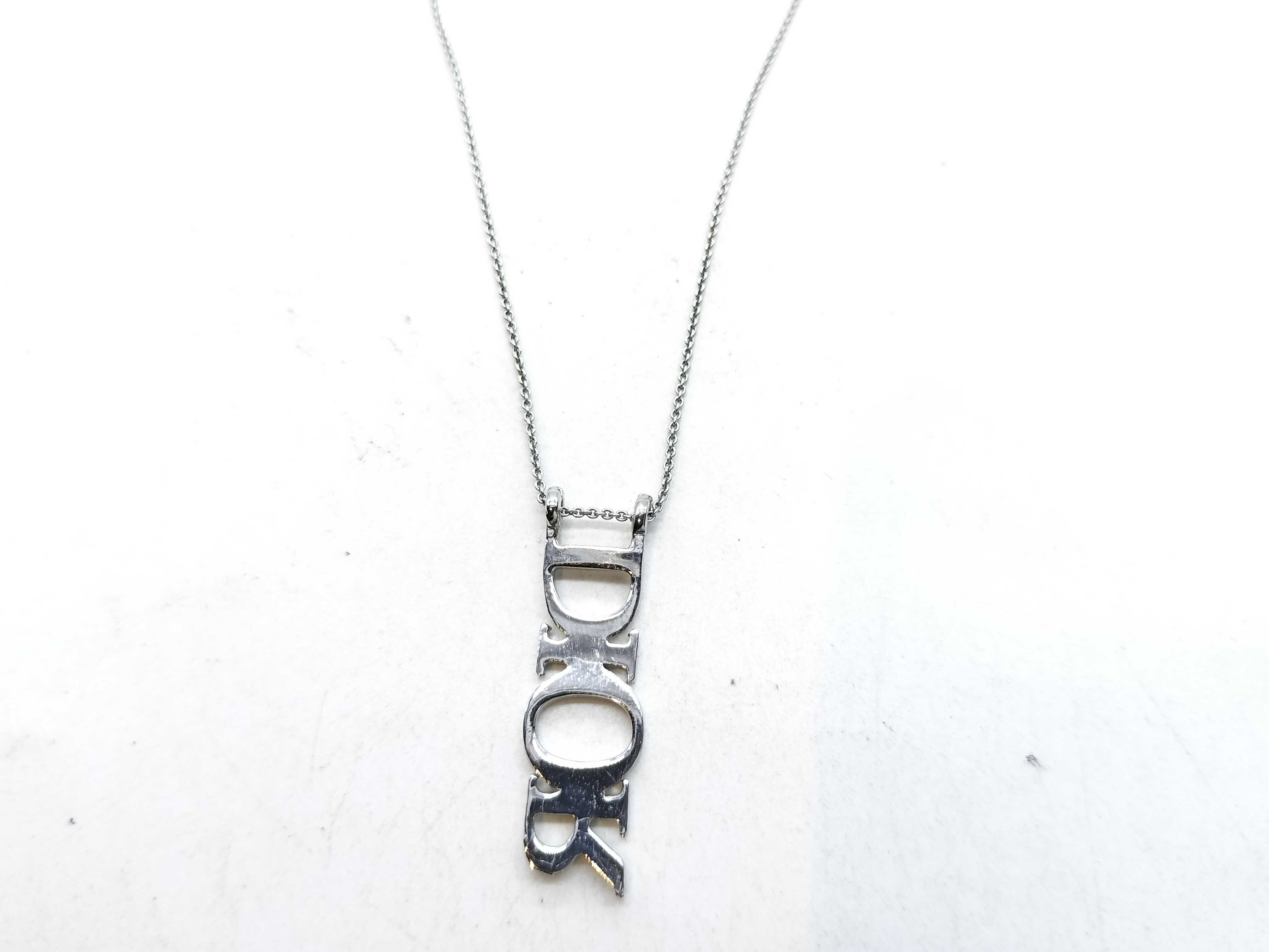 silver-colored necklace — view 2