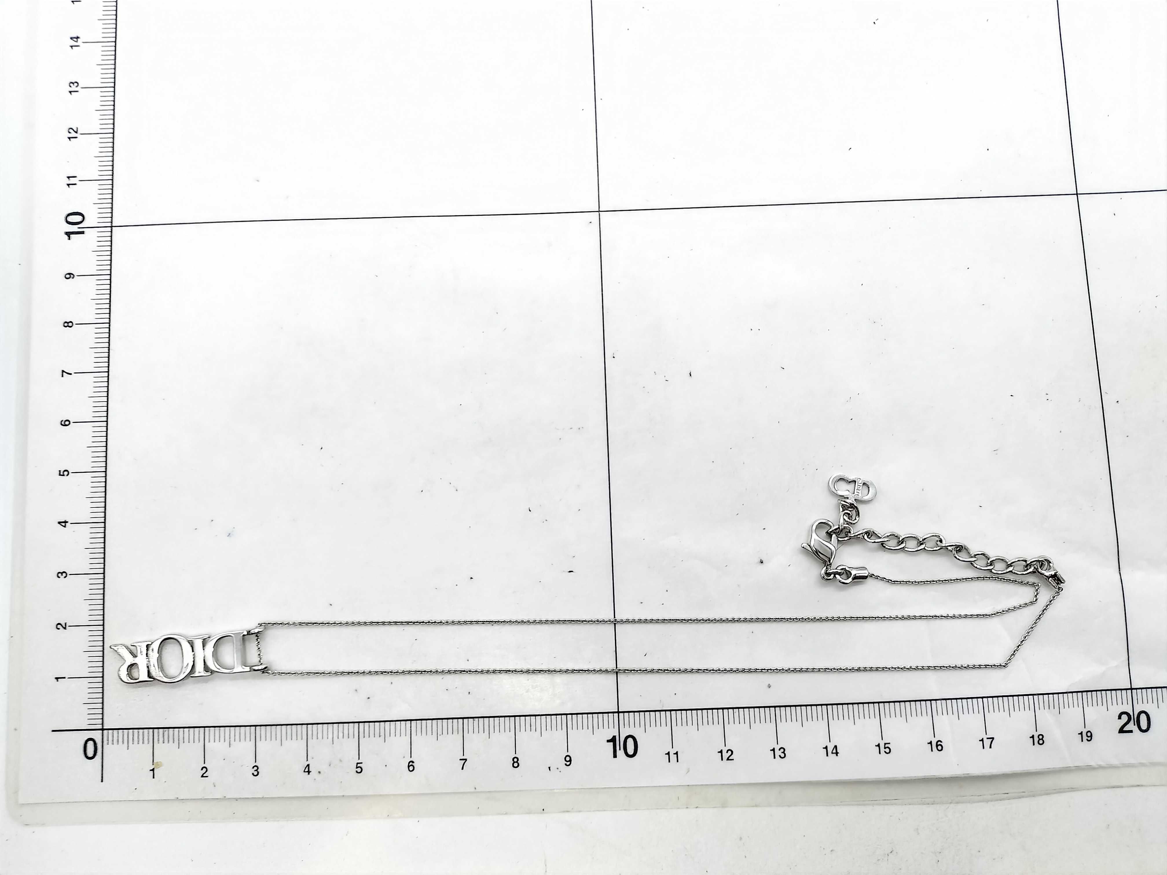 silver-colored necklace — view 6
