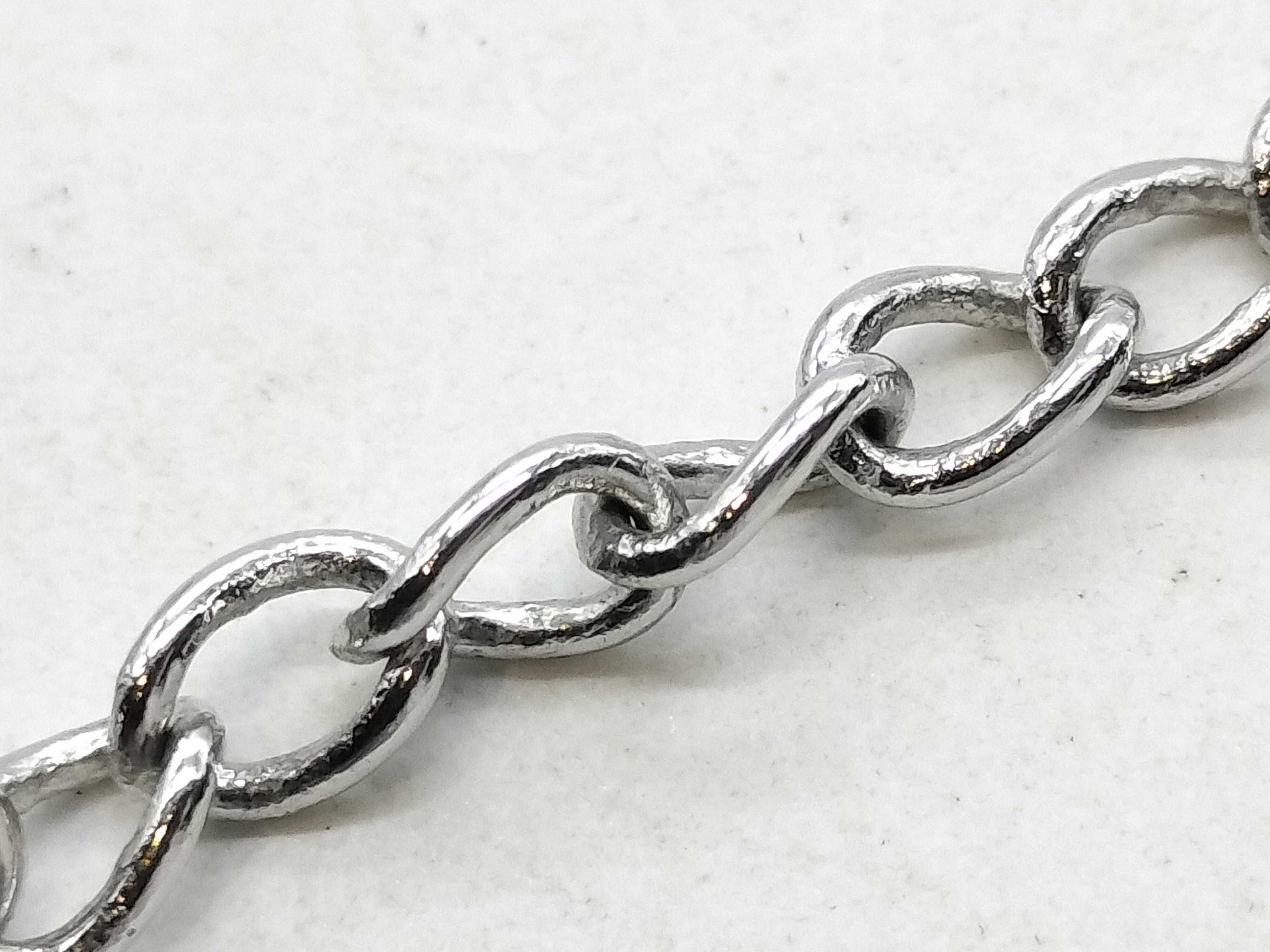 silver-colored necklace — view 8