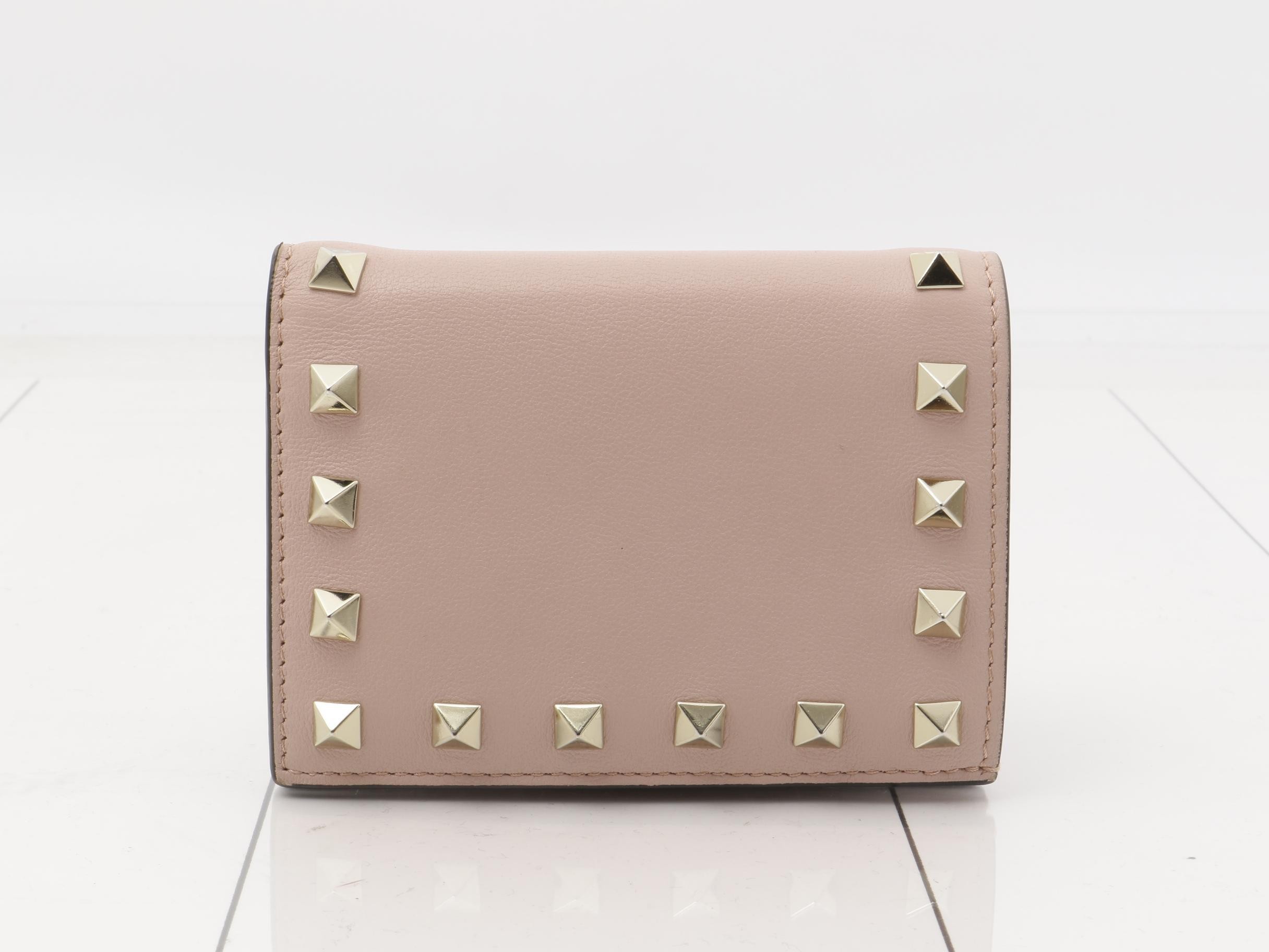 Bi-fold wallet, studs, pink leather