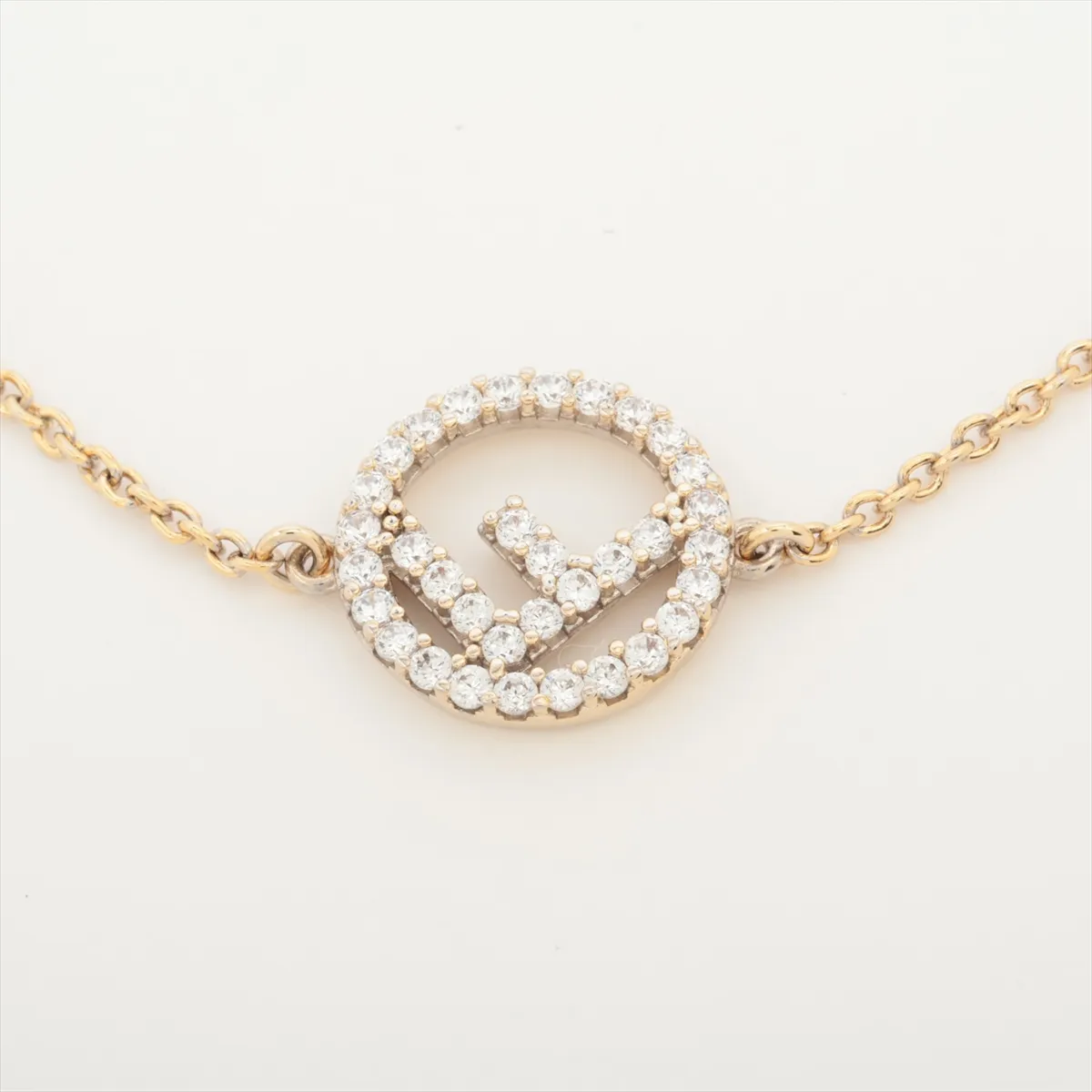 F is Fendi bracelet, gold plated with rhinestones. Shows signs of wear, — view 2