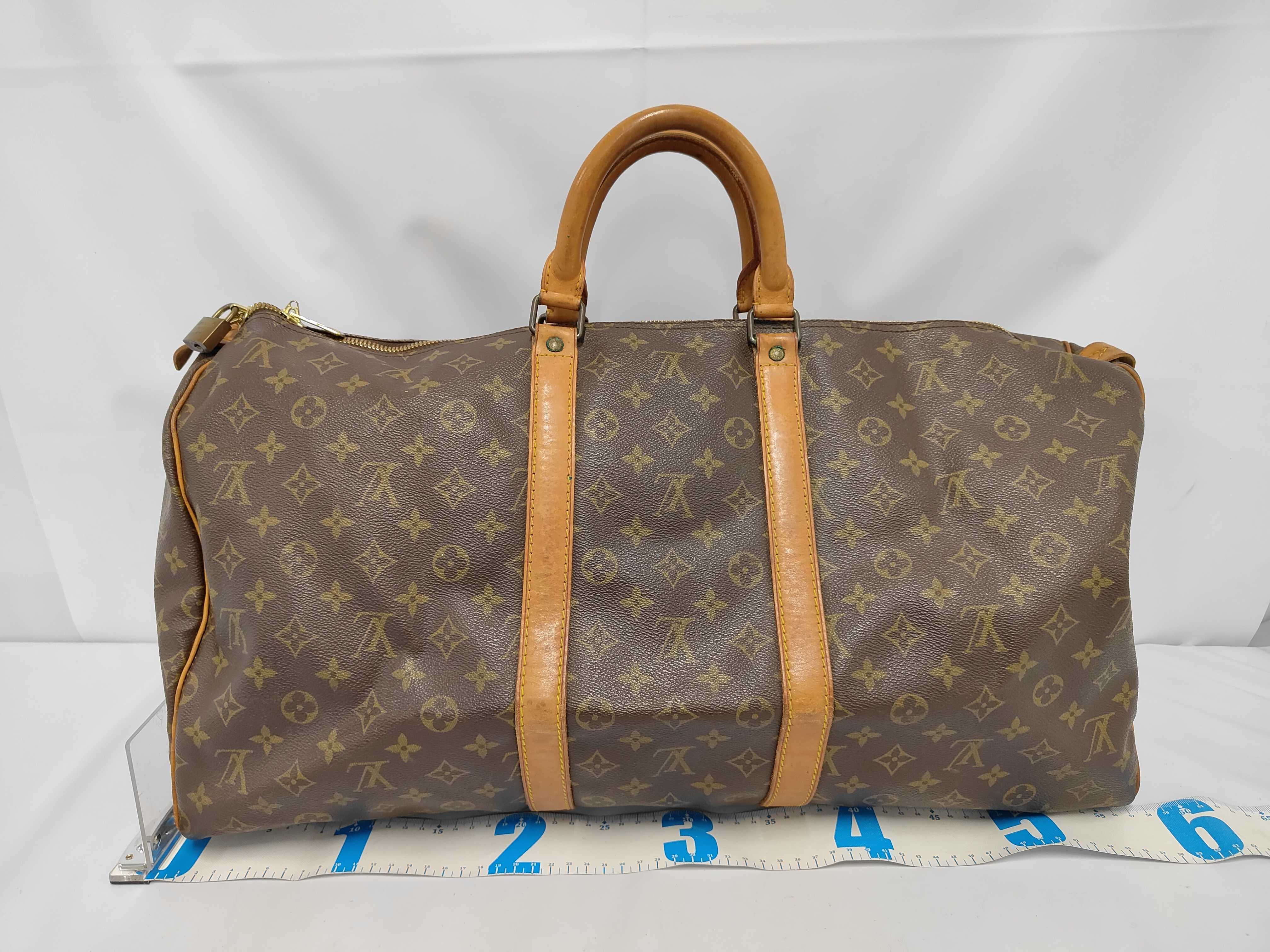 Keepall 55 Monogram Boston Bag with Padlock, Handle, and Name Tag — view 2
