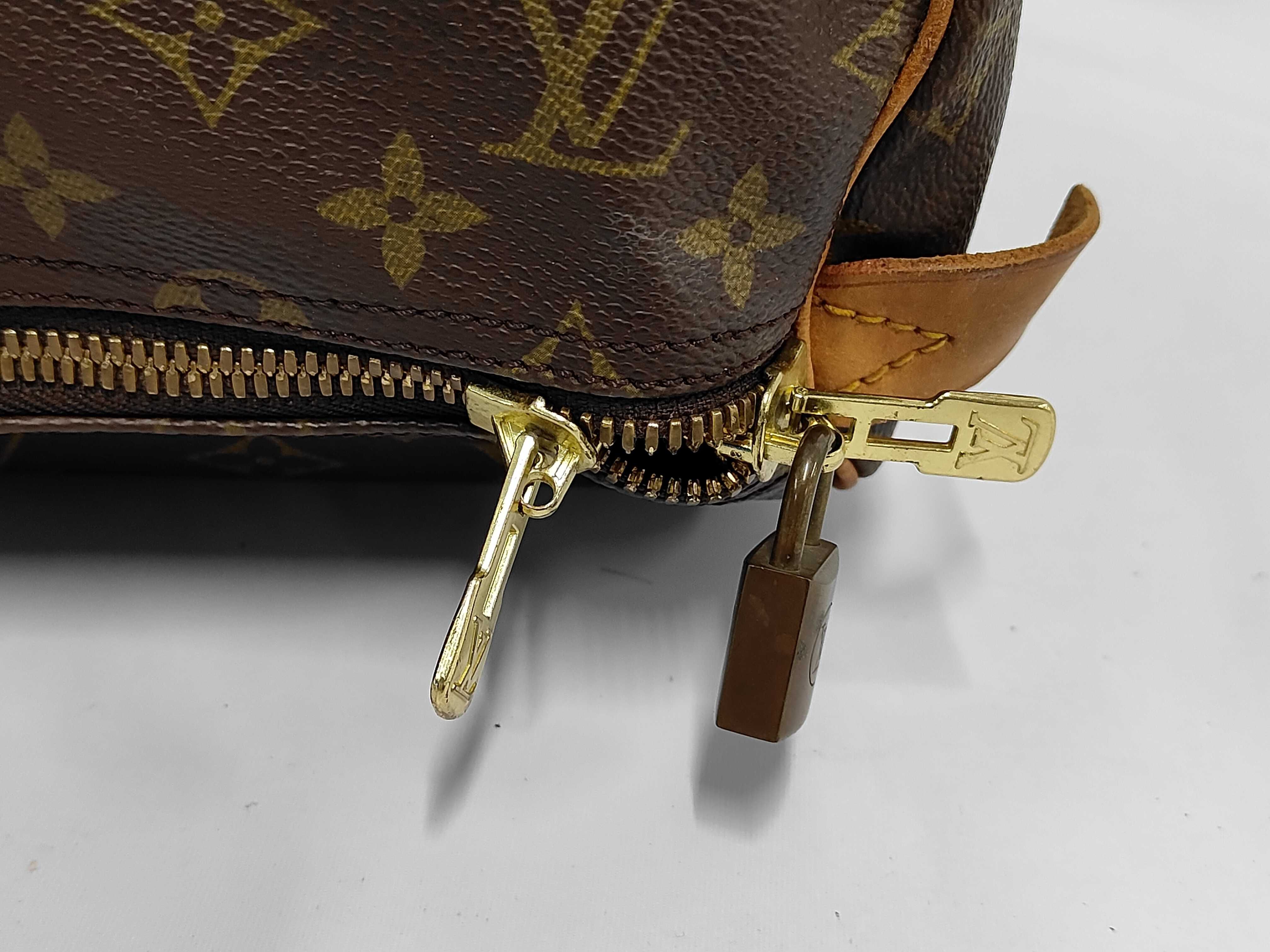 Keepall 55 Monogram Boston Bag with Padlock, Handle, and Name Tag — view 9