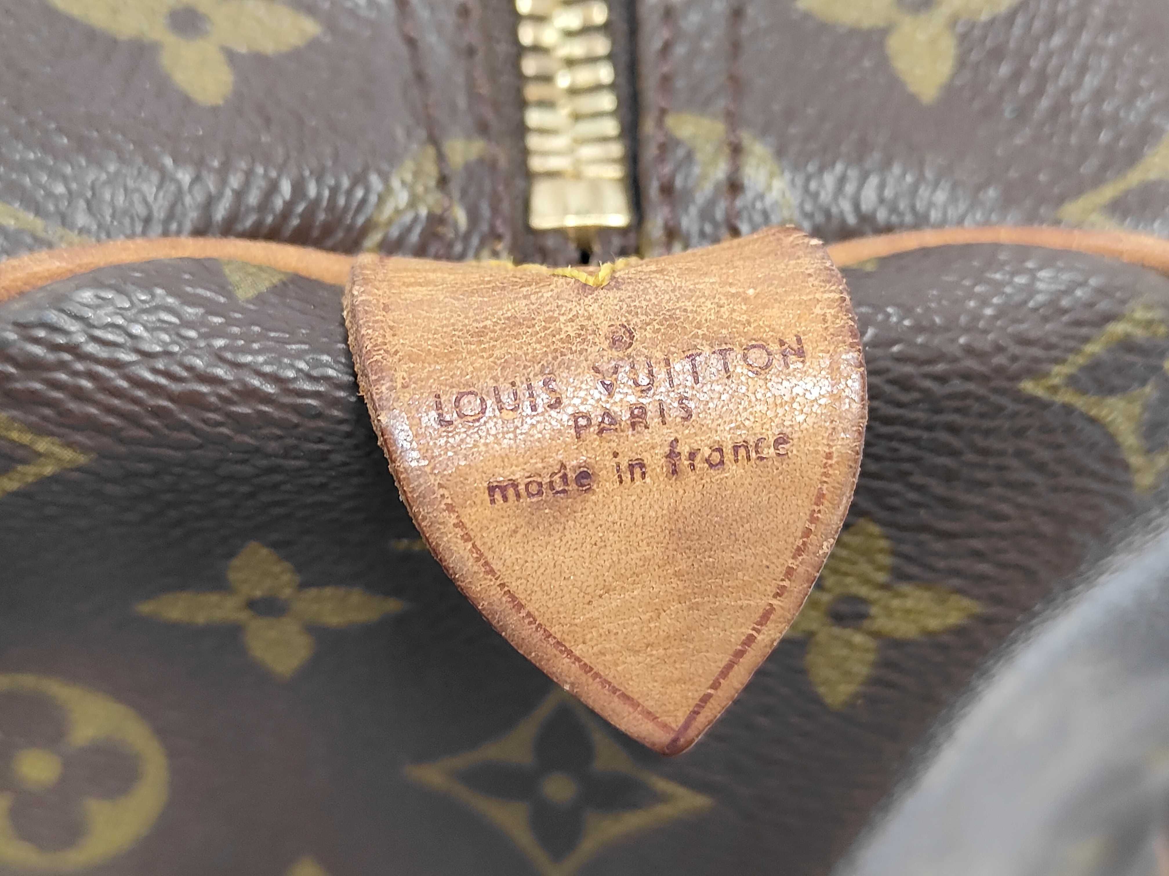 Keepall 55 Monogram Boston Bag with Padlock, Handle, and Name Tag — view 10