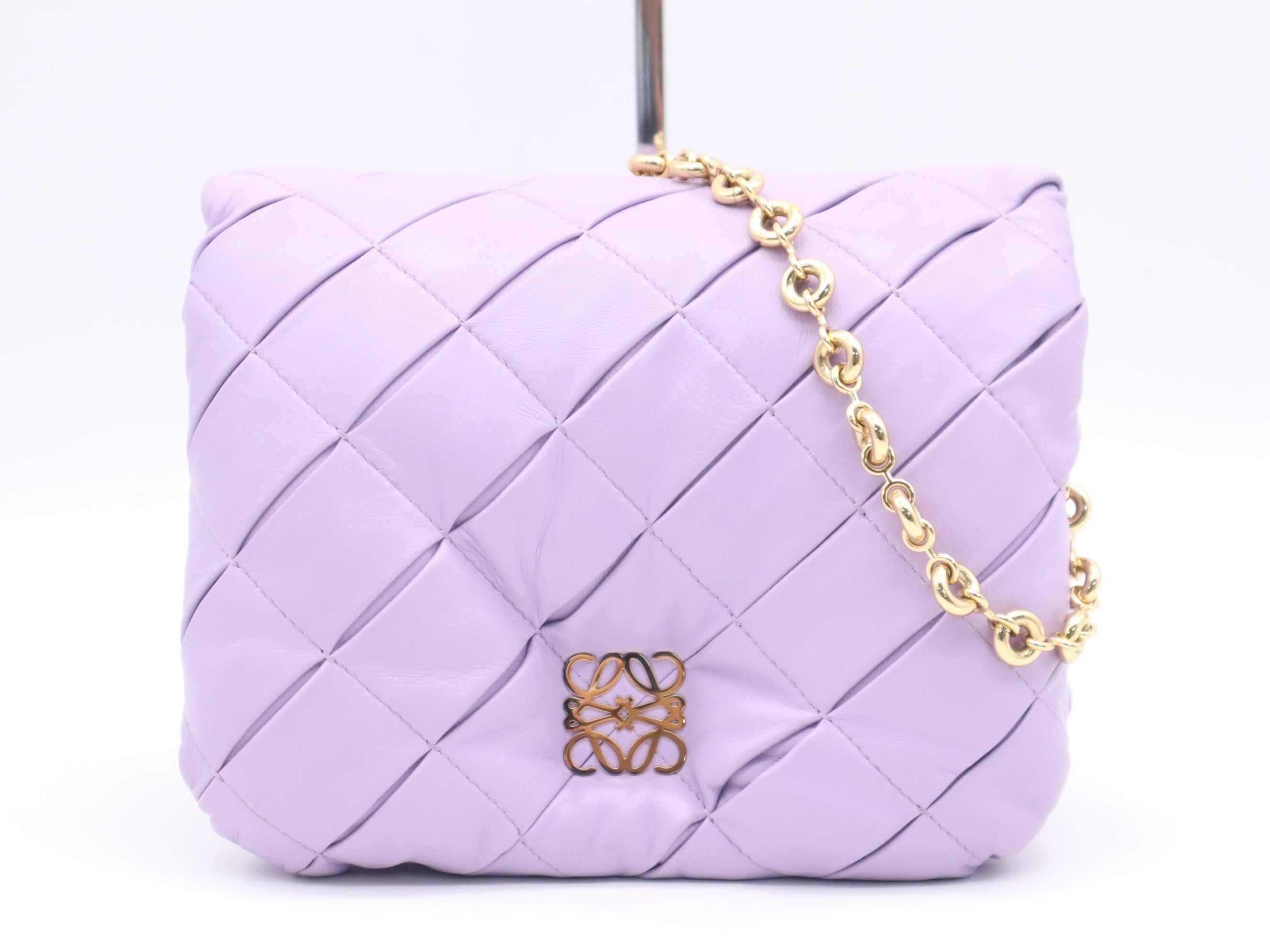 Lambskin puffer bag, Goya style, purple, gold hardware, with shoulder strap.