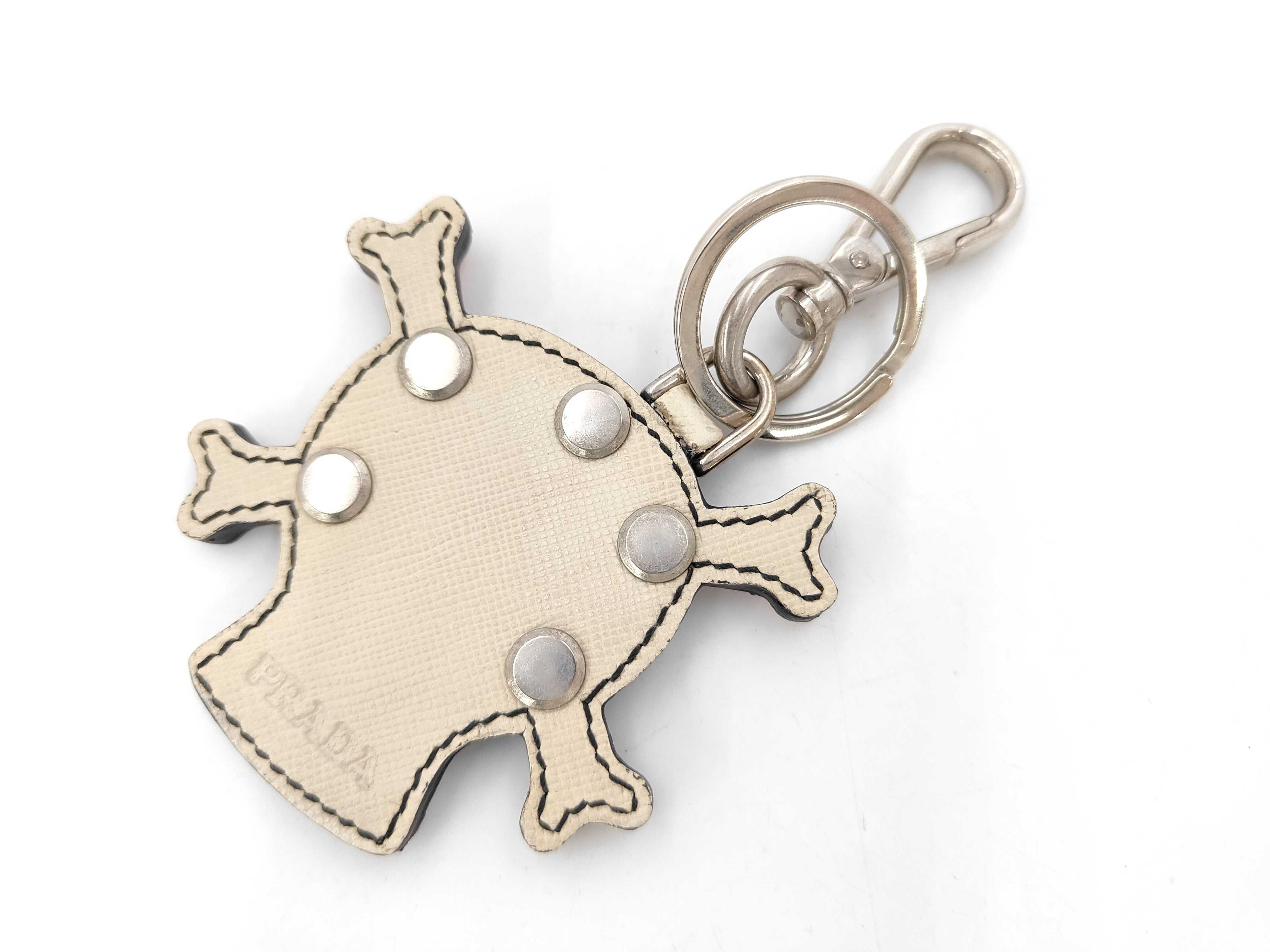 Skull and crossbones charm and other accessories — view 2
