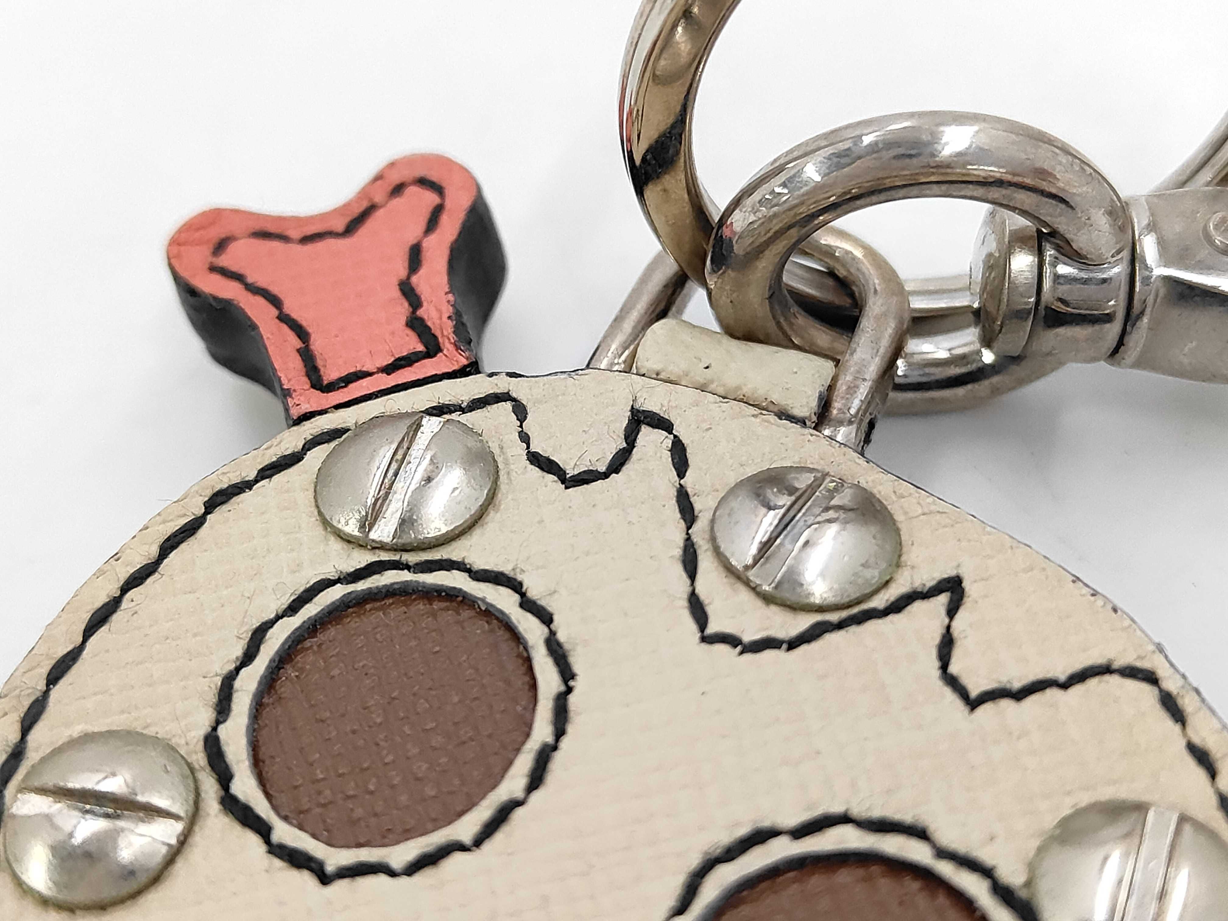 Skull and crossbones charm and other accessories — view 5