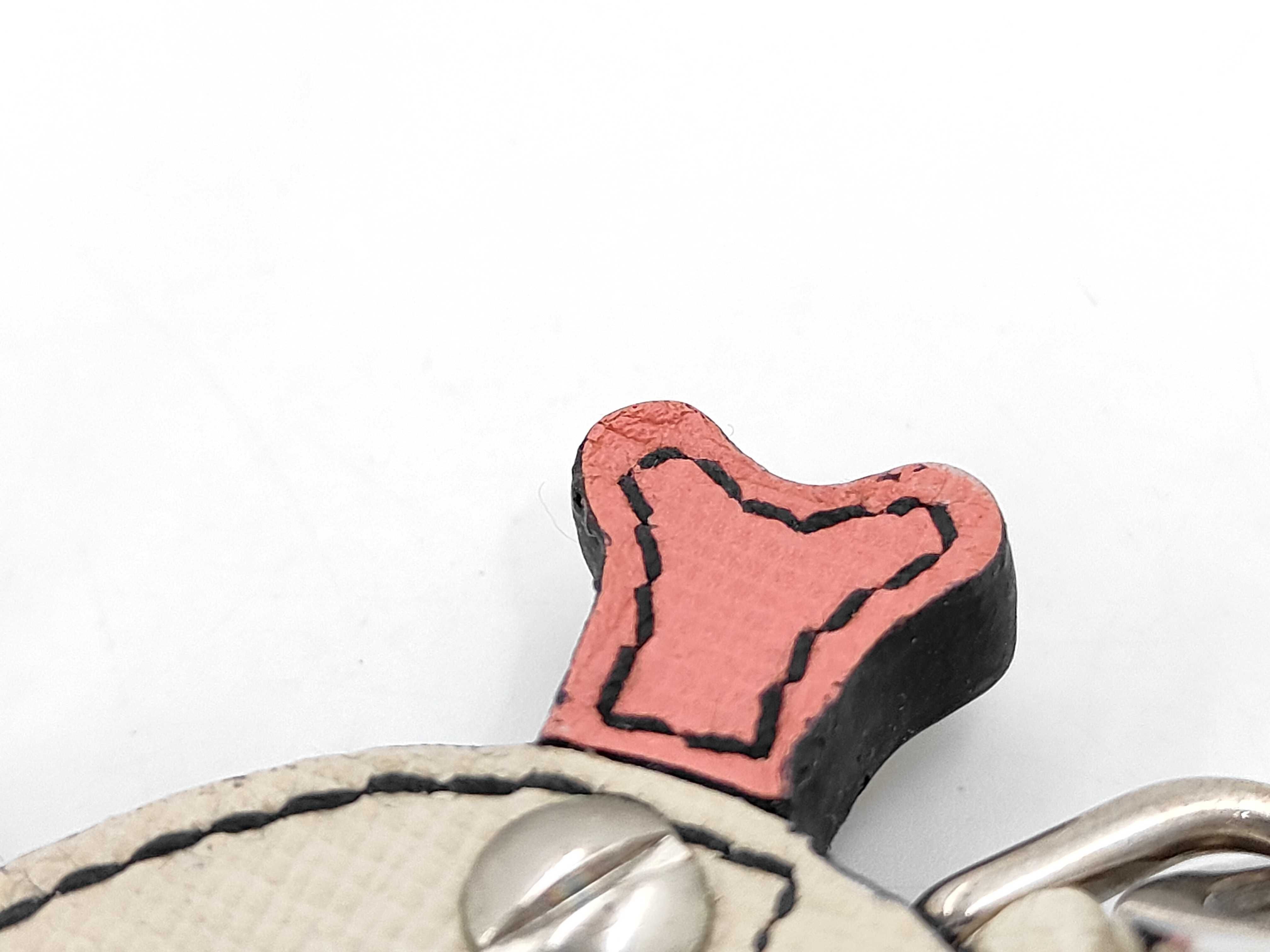 Skull and crossbones charm and other accessories — view 6