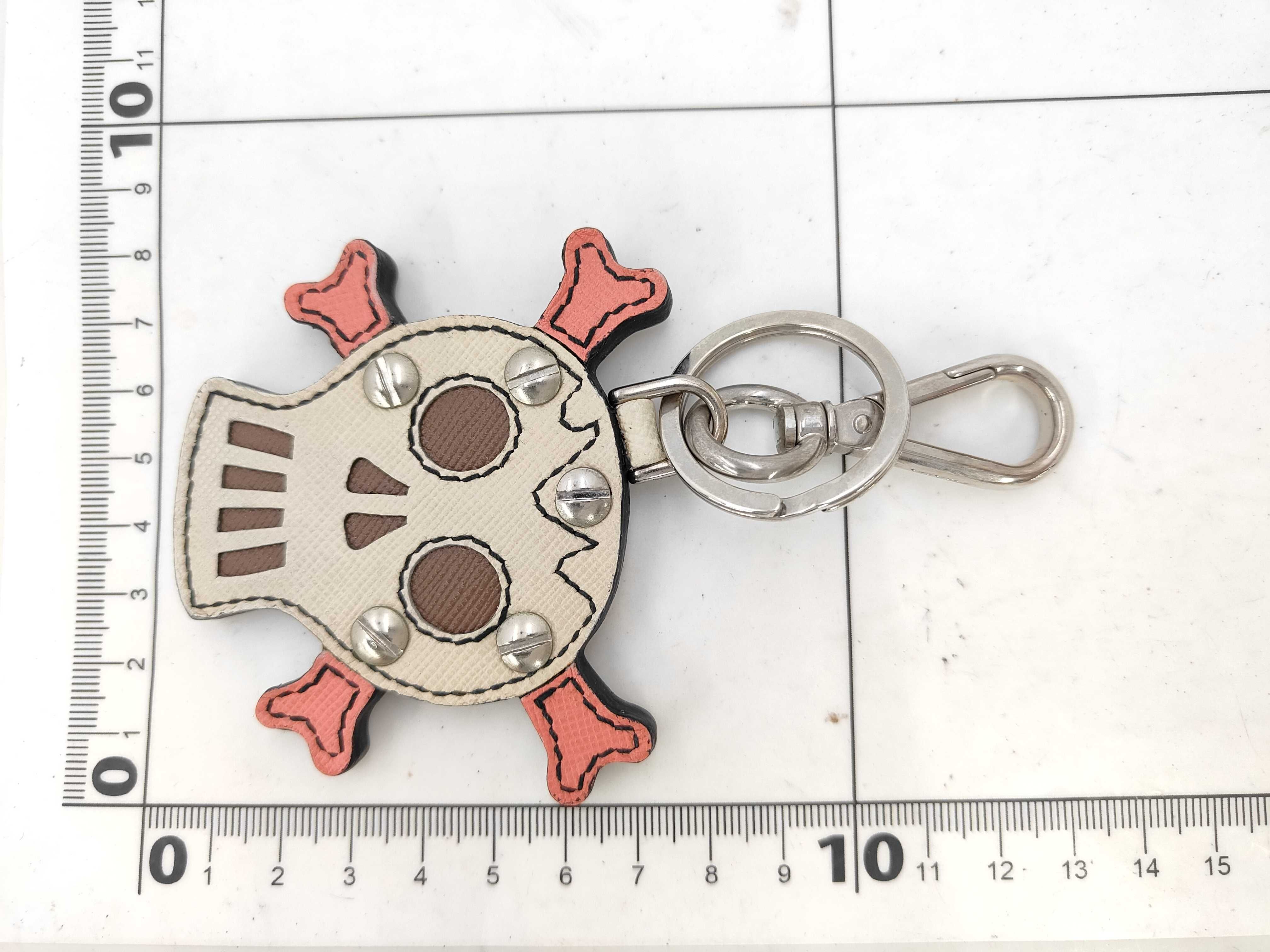 Skull and crossbones charm and other accessories — view 7