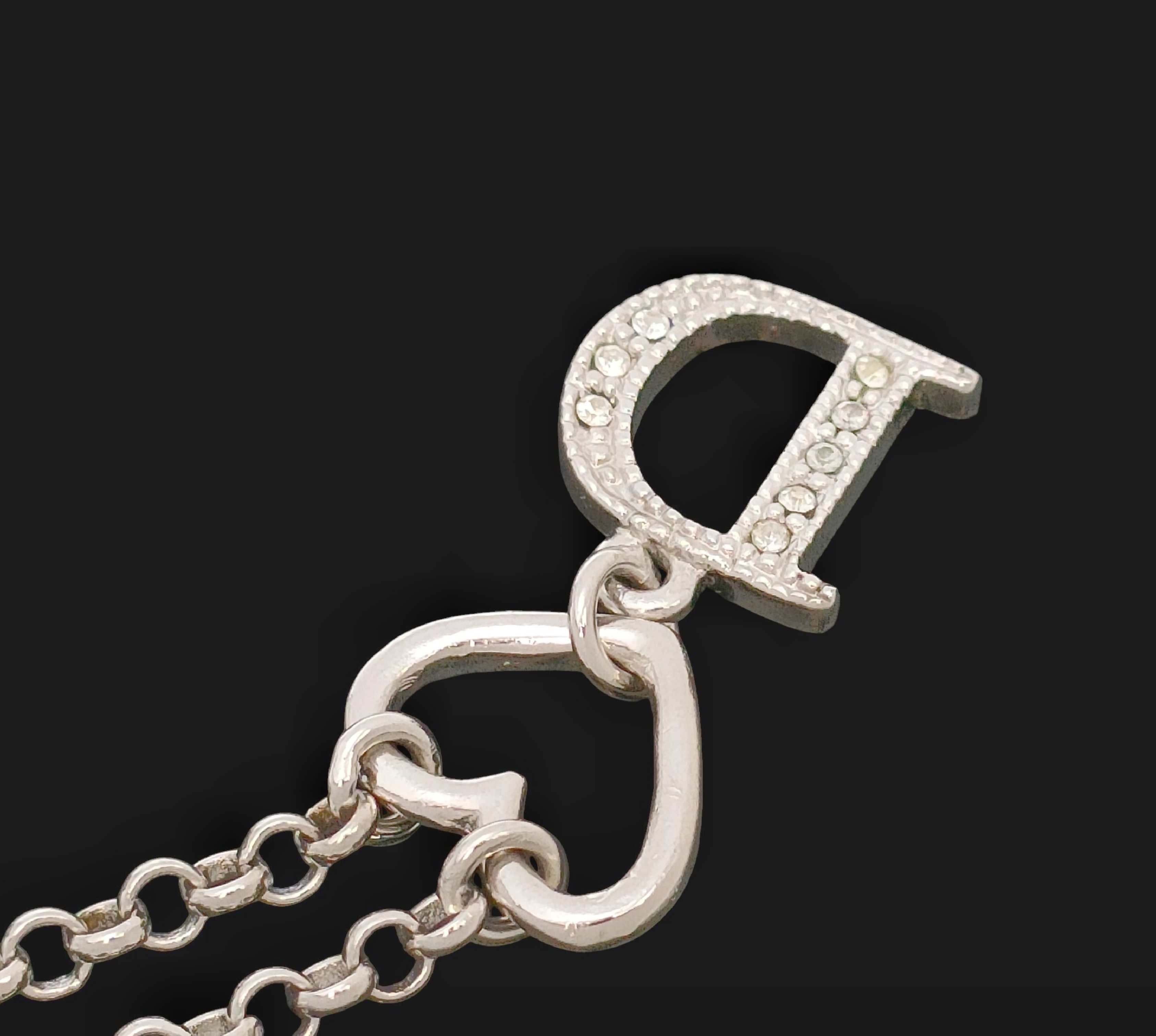 Silver-colored rhinestone-embellished logo and heart motif pendant necklace, 6.52g. — view 9