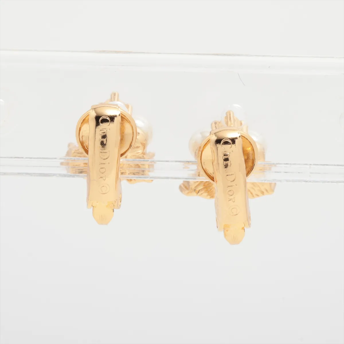 earrings (for both ears), gold-plated with rhinestones and faux pearls. There are — view 2